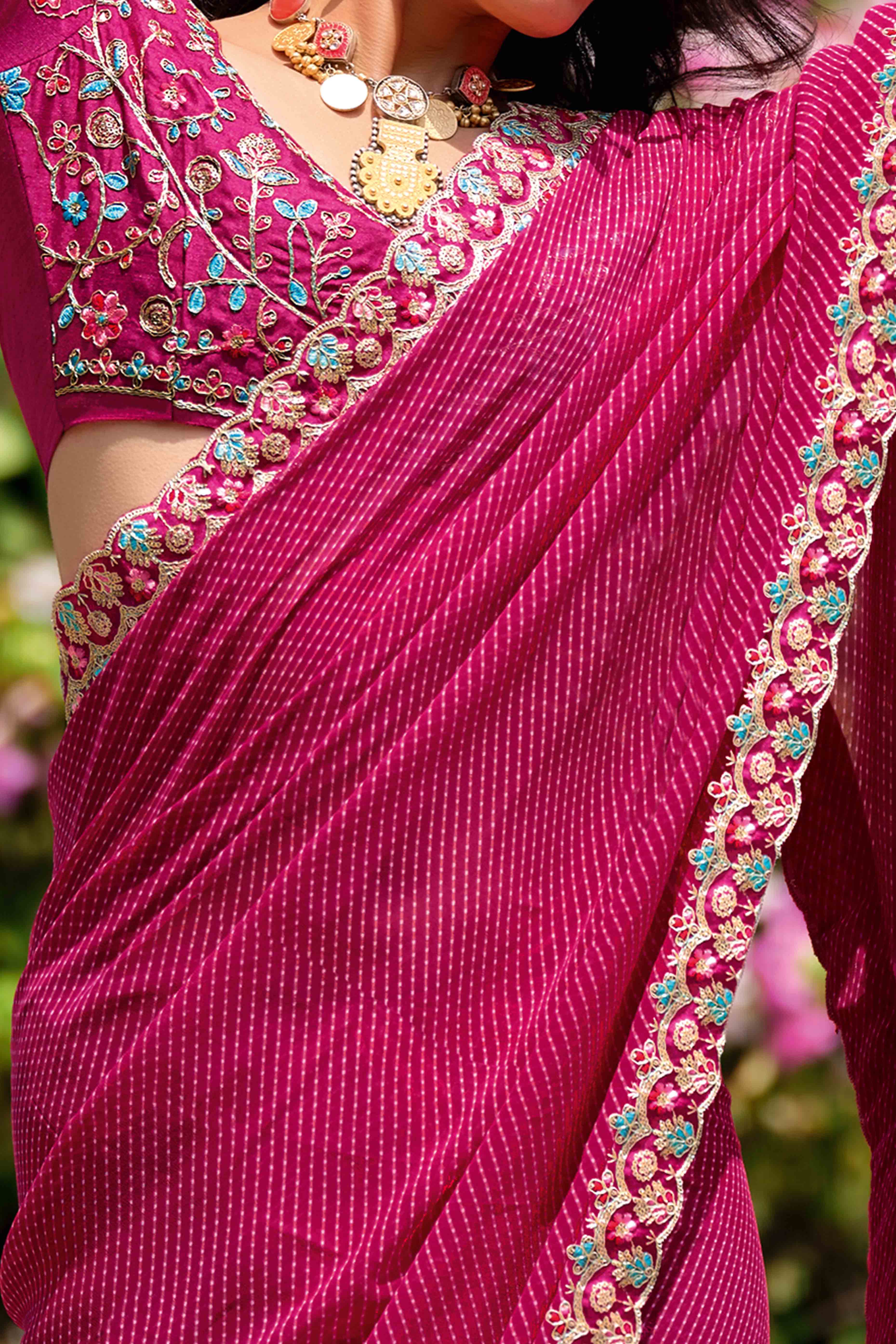 Rani Pink Striped Printed Georgette Saree With Shimmering Sequin Embroidered Border