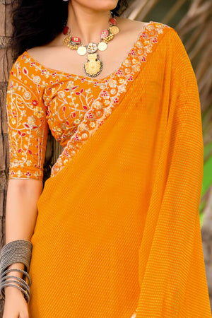 Bright Orange Striped Printed Georgette Saree With Shimmering Sequin Embroidered Border