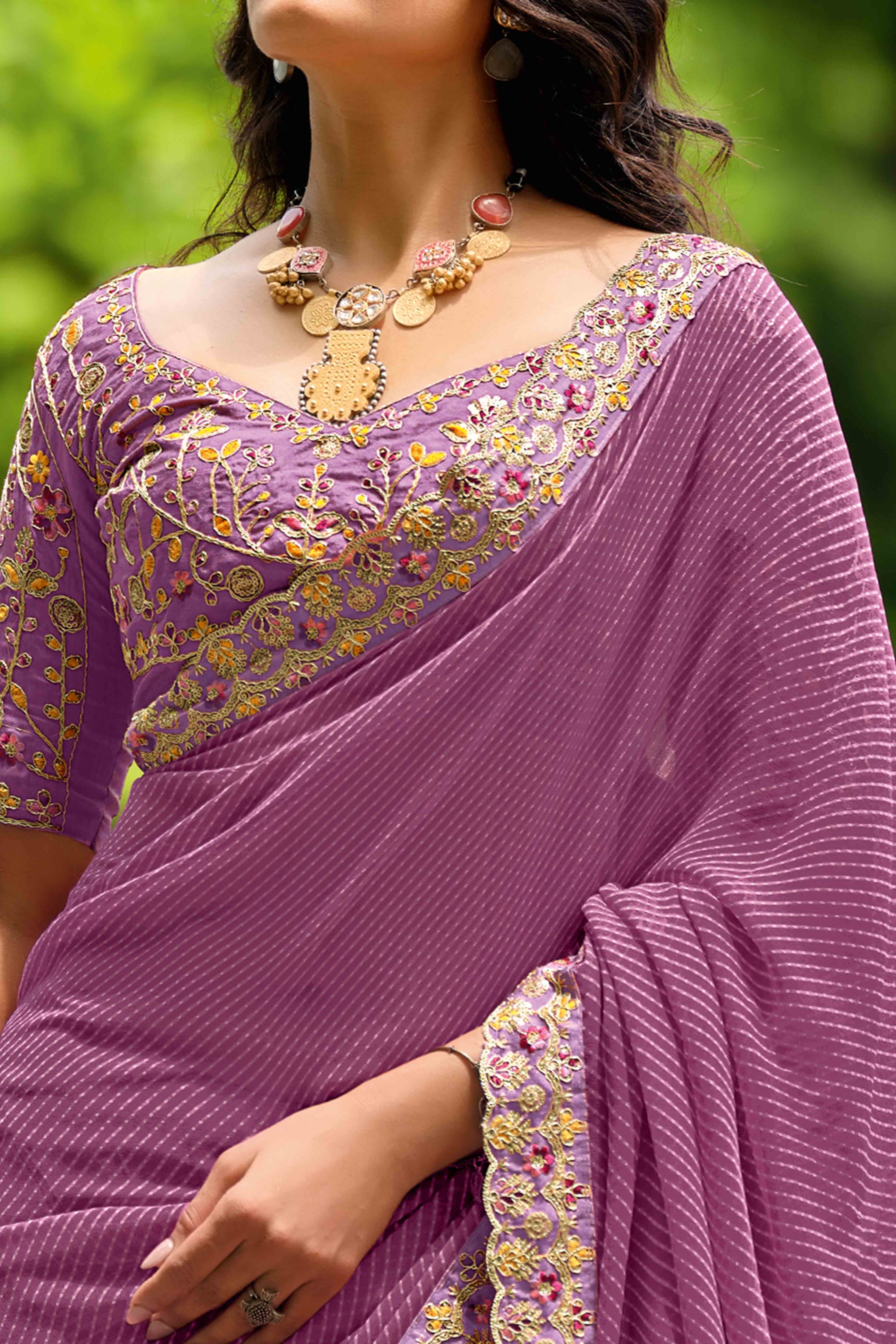 Lavender Striped Printed Georgette Saree With Shimmering Sequin Embroidered Border