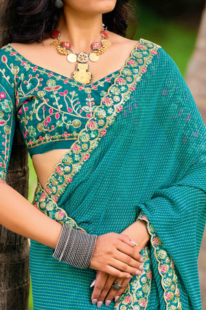 Rama Blue Striped Printed Georgette Saree With Shimmering Sequin Embroidered Border