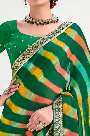 Green Striped Printed Chiffon Saree Enhanced With Sparkling Sequins Embroidered Border Work