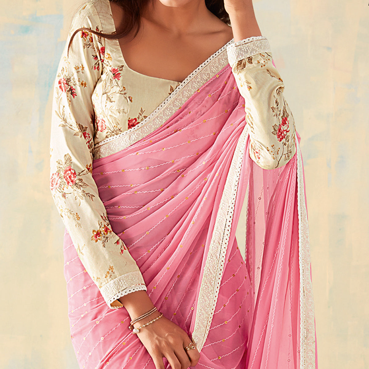 Pink Foil Printed Georgette Saree With Tassels