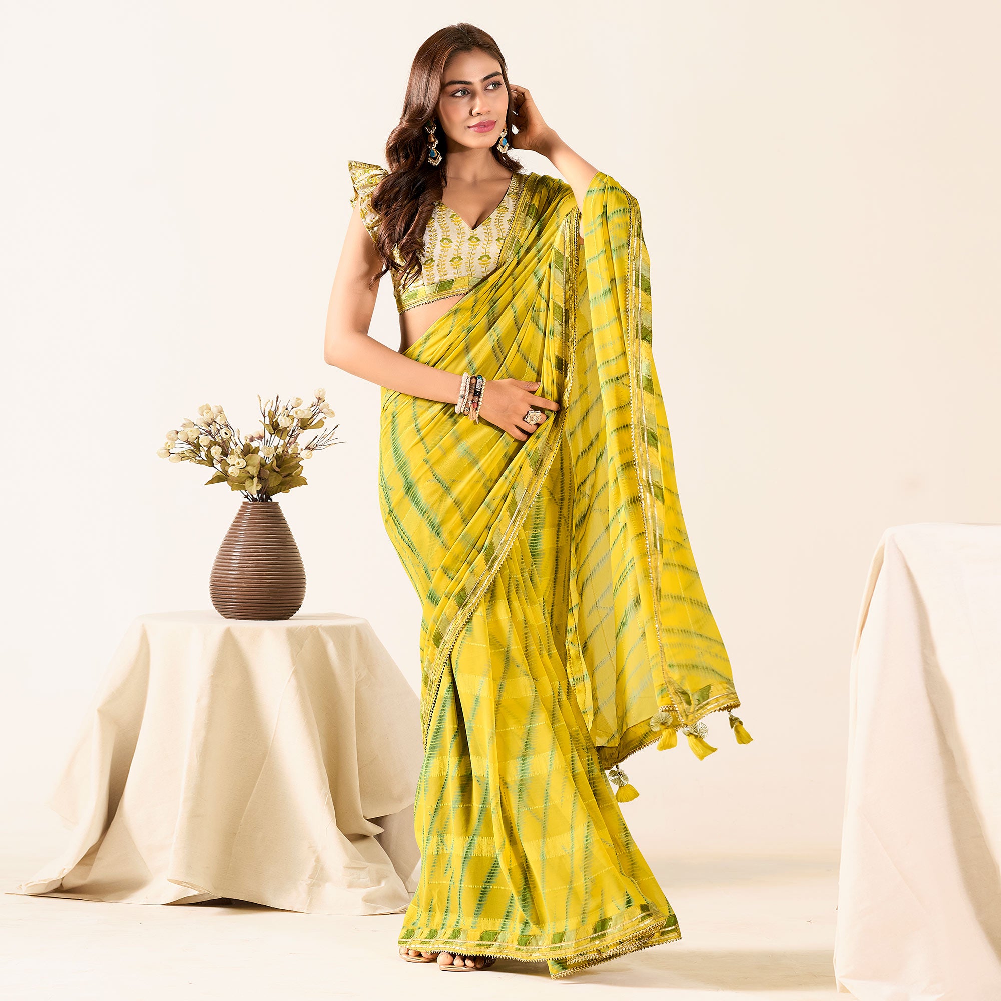 Yellow Printed With Woven Georgette Saree With Tassels