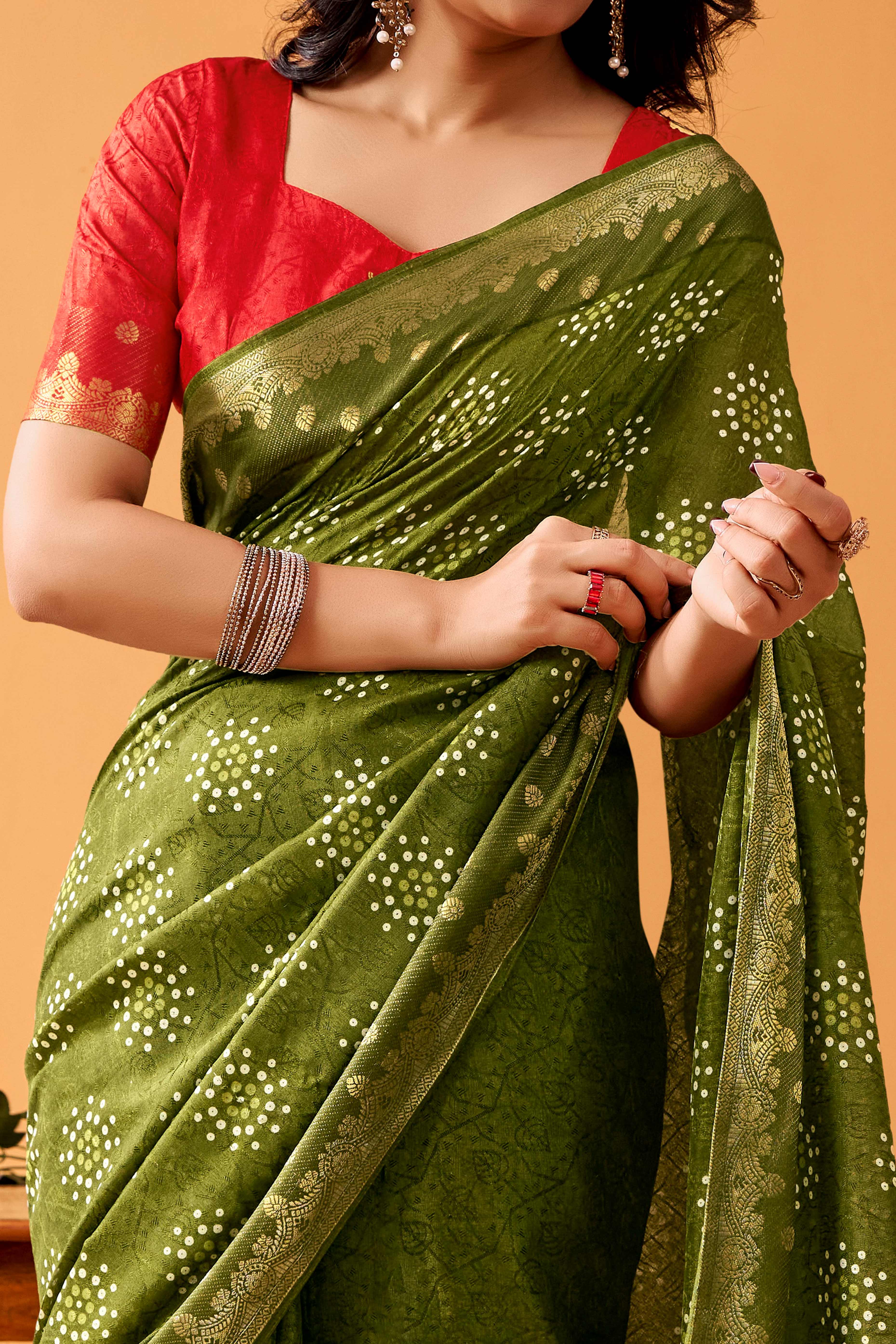 Luxurious Green Tussar Silk Saree Featuring Traditional Bandhani Print & Peacock Jacquard Border