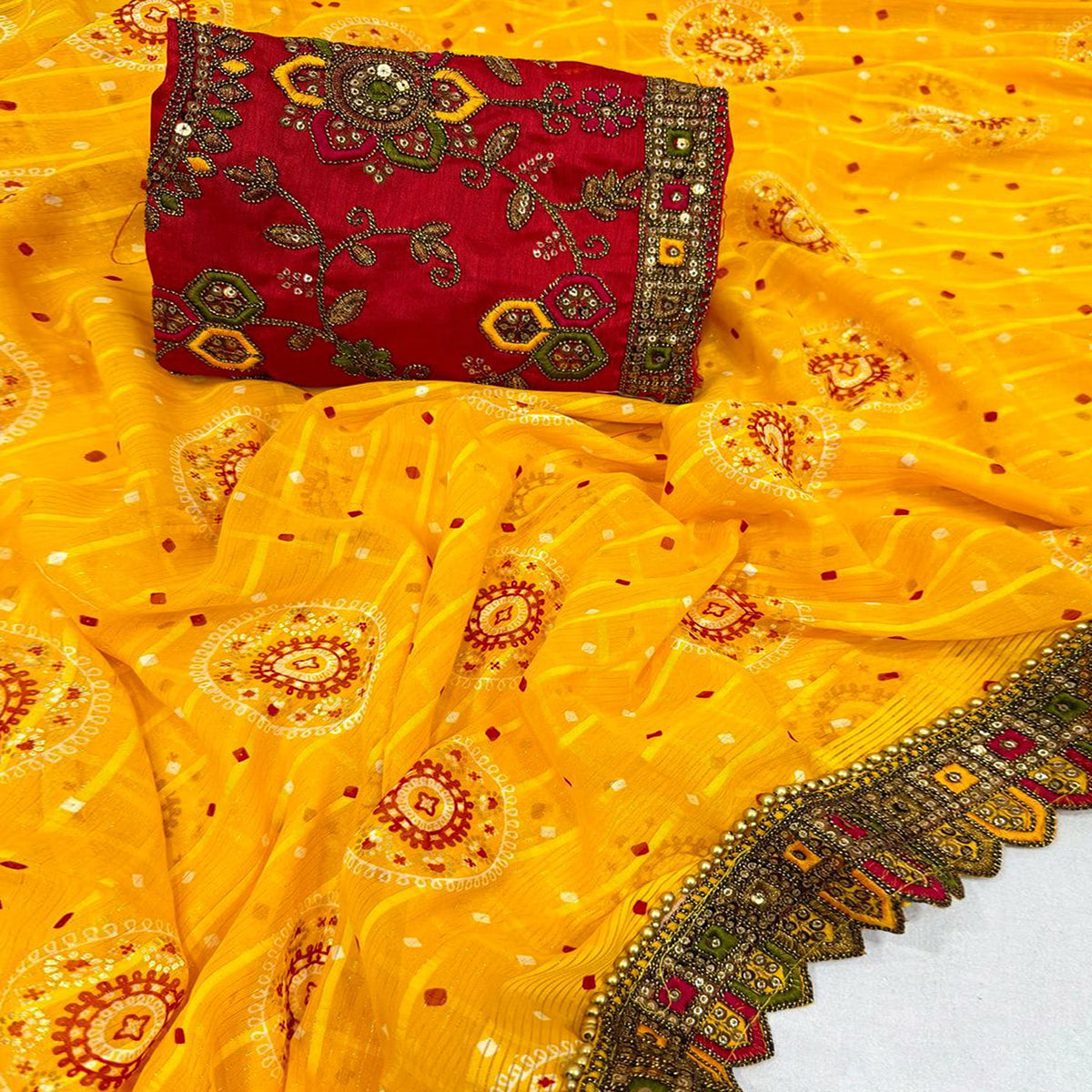 Yellow Bandhani Printed Georgette Saree for Festive Wear with Lace Detailing