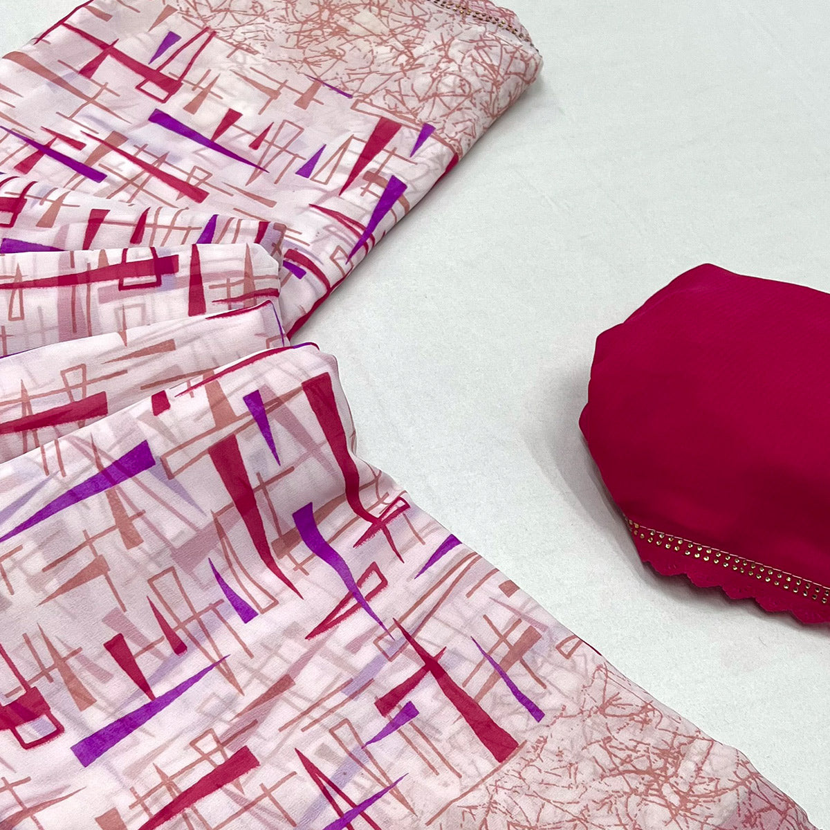 White & Rani Pink Geometric Printed Georgette Saree