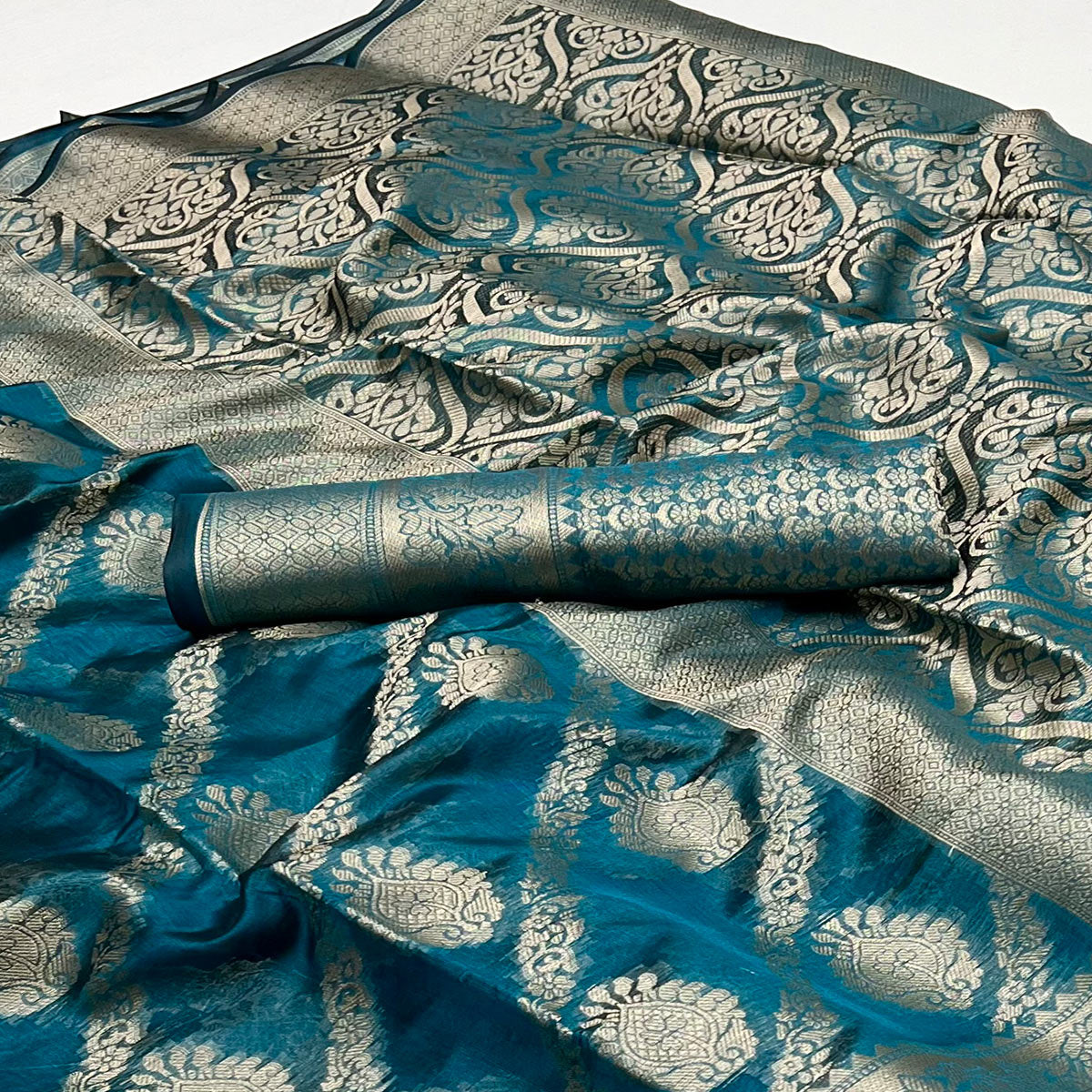 Teal Blue Floral Woven Organza Saree