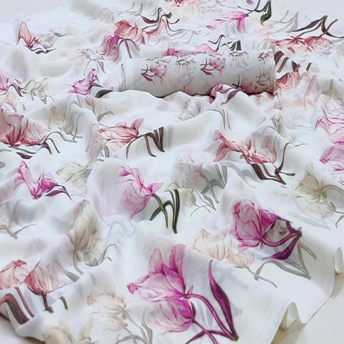 White Georgette Saree With Lightweight Drape And Dreamy Floral Motifs