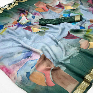 Graceful Dark Green Georgette Saree Accented With Digital Prints & Viscose Border Finish