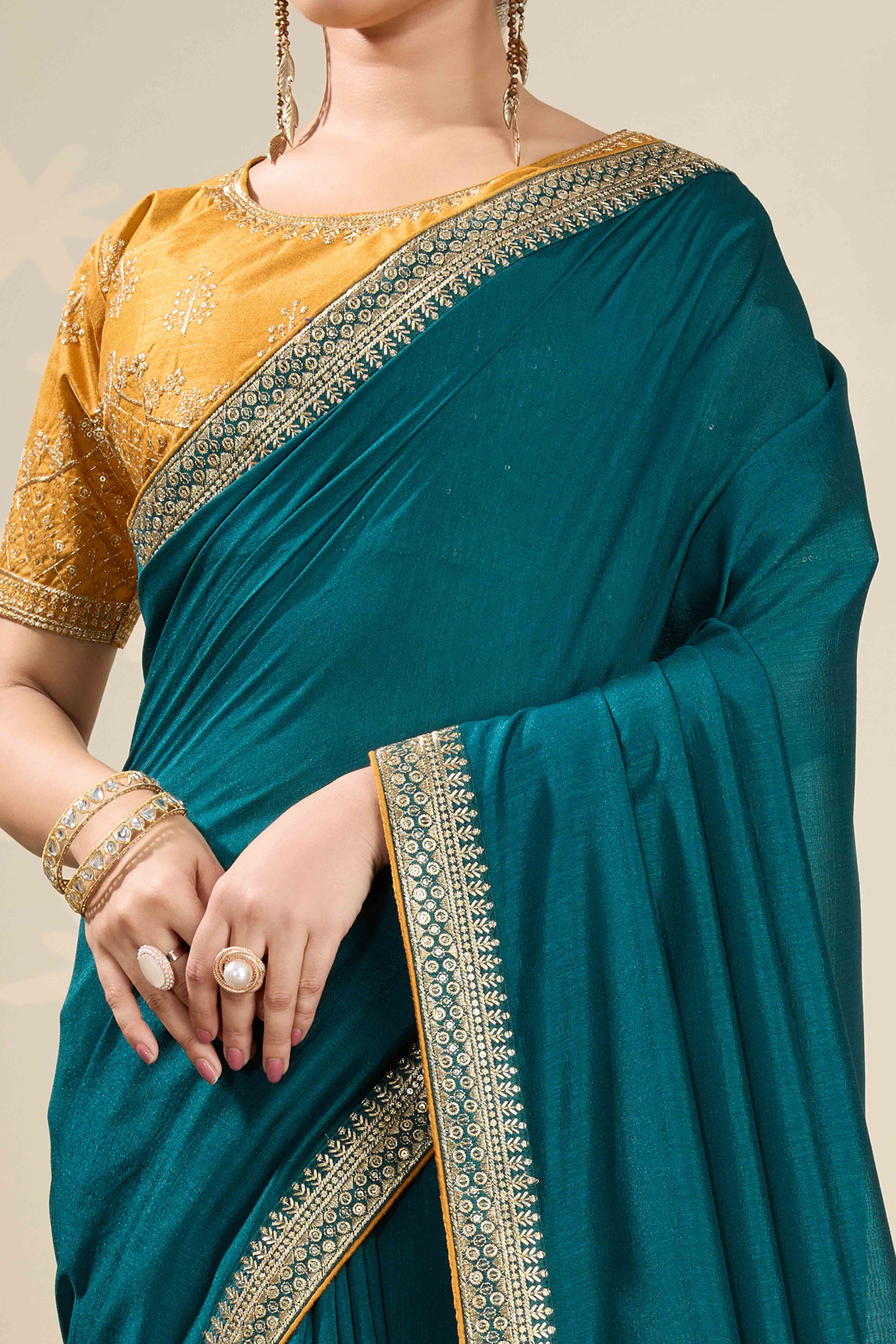 Graceful Vichitra Silk Saree in Teal with Embroidered Bordering
