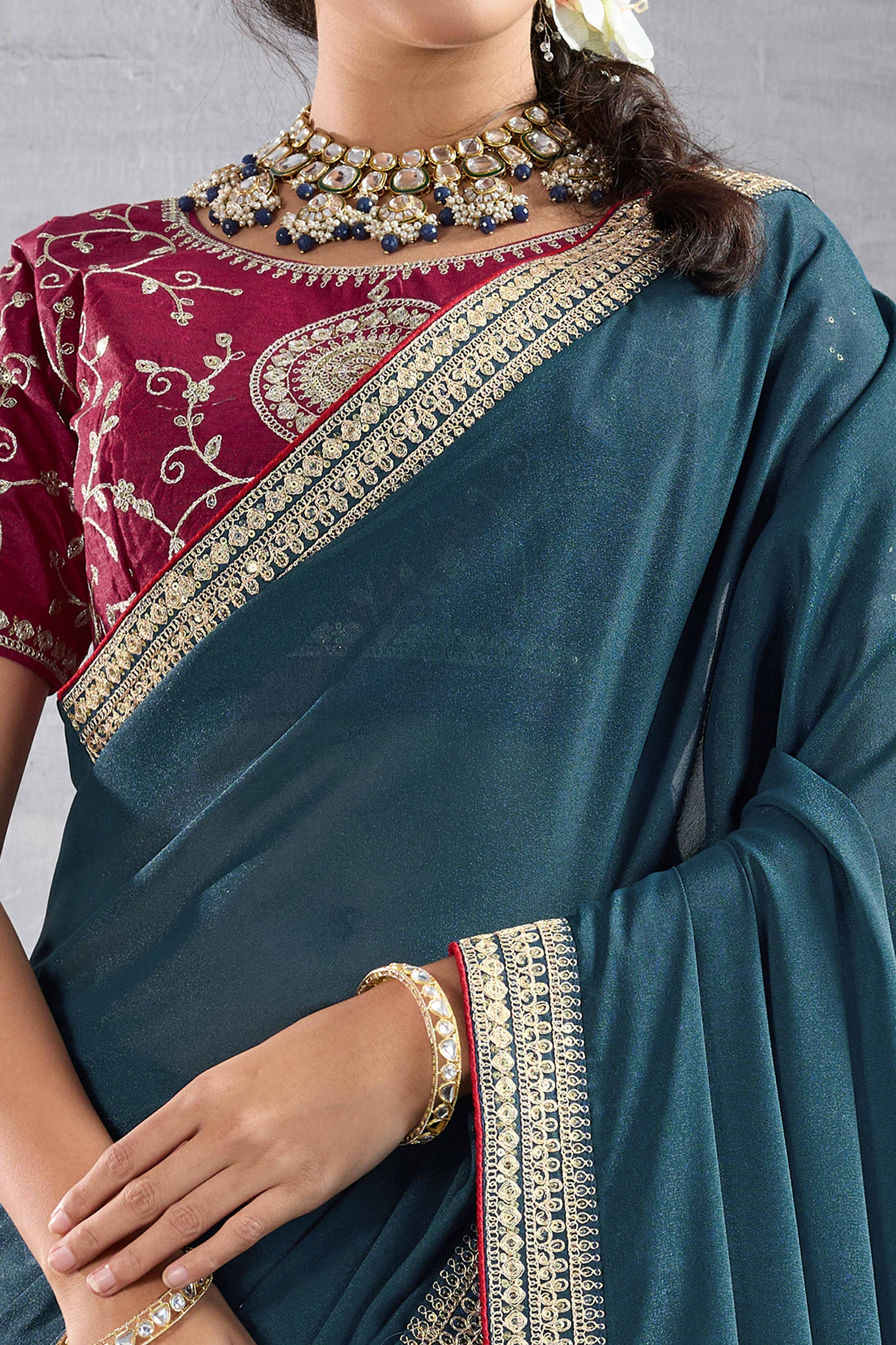 Teal Solid Saree In Georgette With Zari & Sequins Embroidery Border