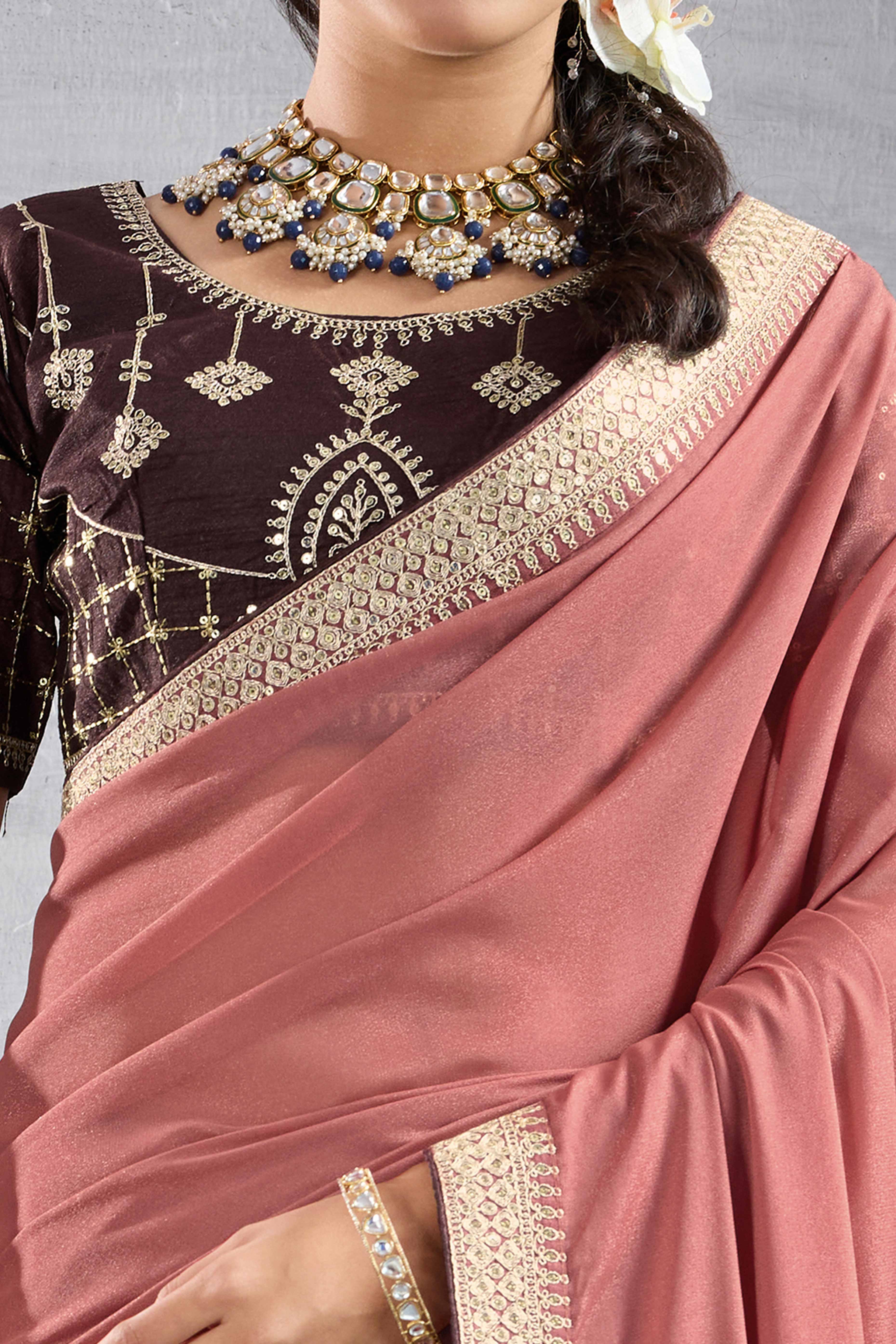 Salmon Pink Solid Saree In Georgette With Zari & Sequins Embroidery Border