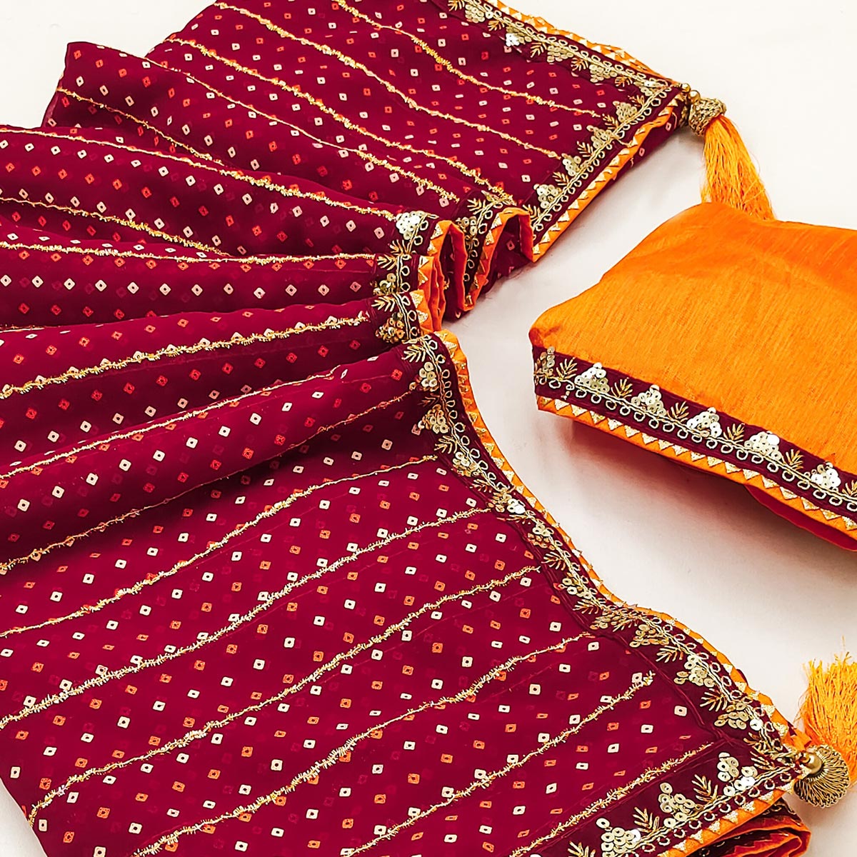 Charming Maroon Bandhani Printed Georgette Saree With Glittering Sequins & Zari Border