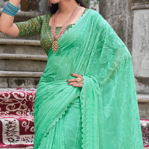 Turquoise Woven With Swarovski Work Brasso Saree