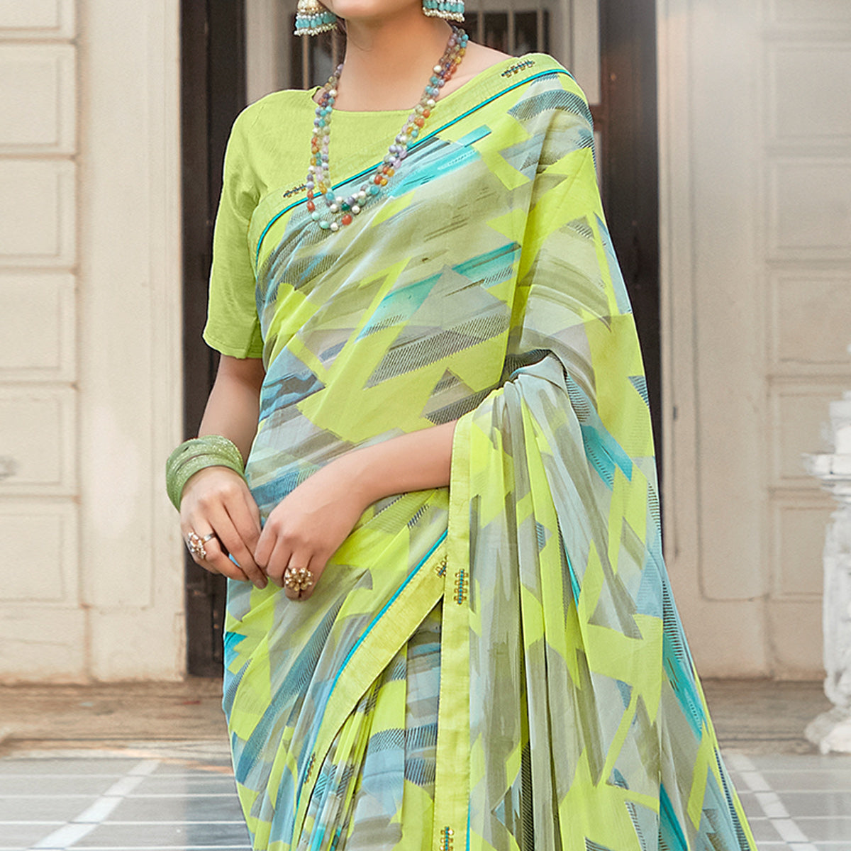 Green Geometric Printed Georgette Saree With Lace Border