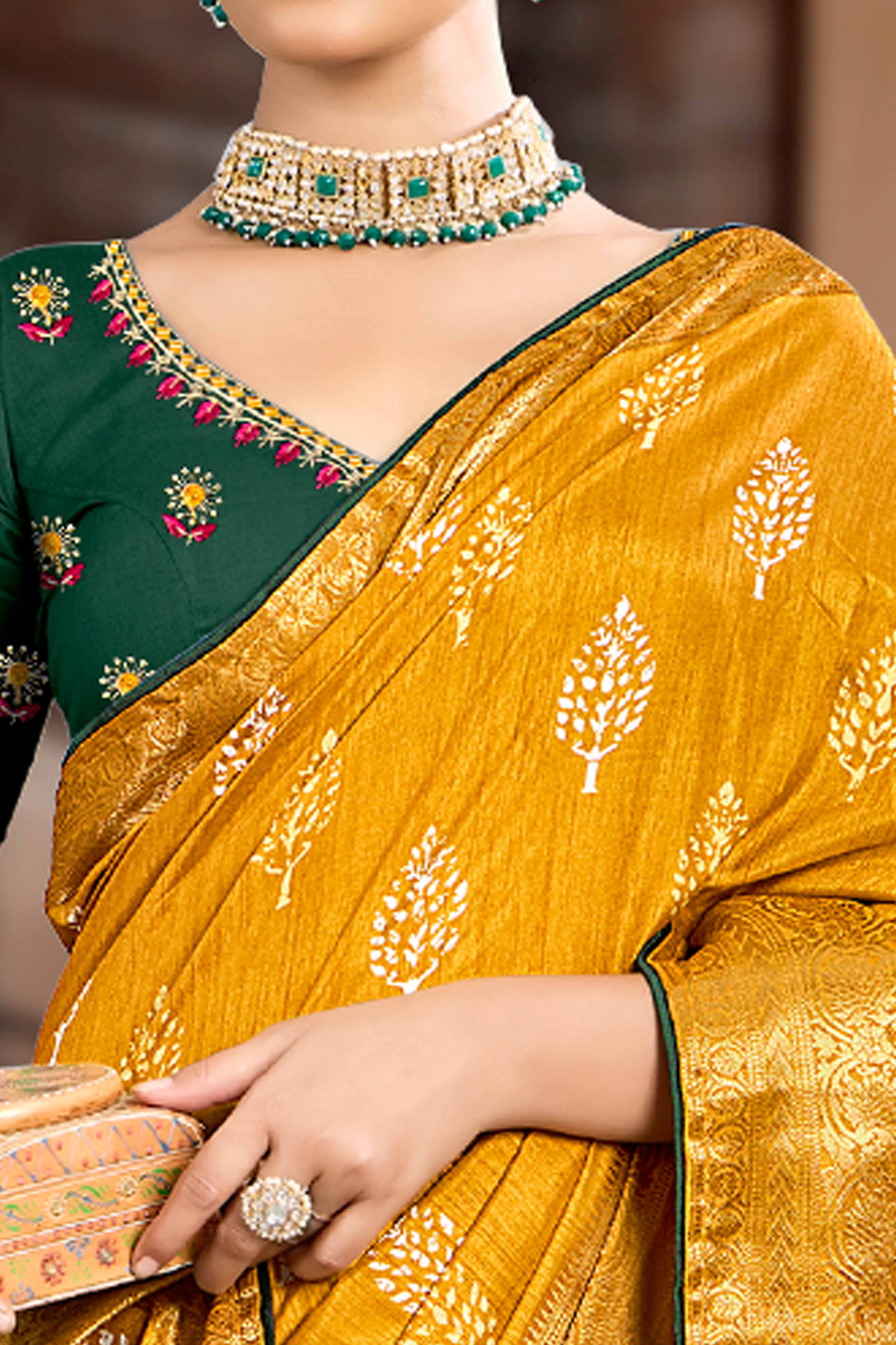 Mustard Dola Silk Saree Featuring Artistic Print Work & Graceful Tassel Edging