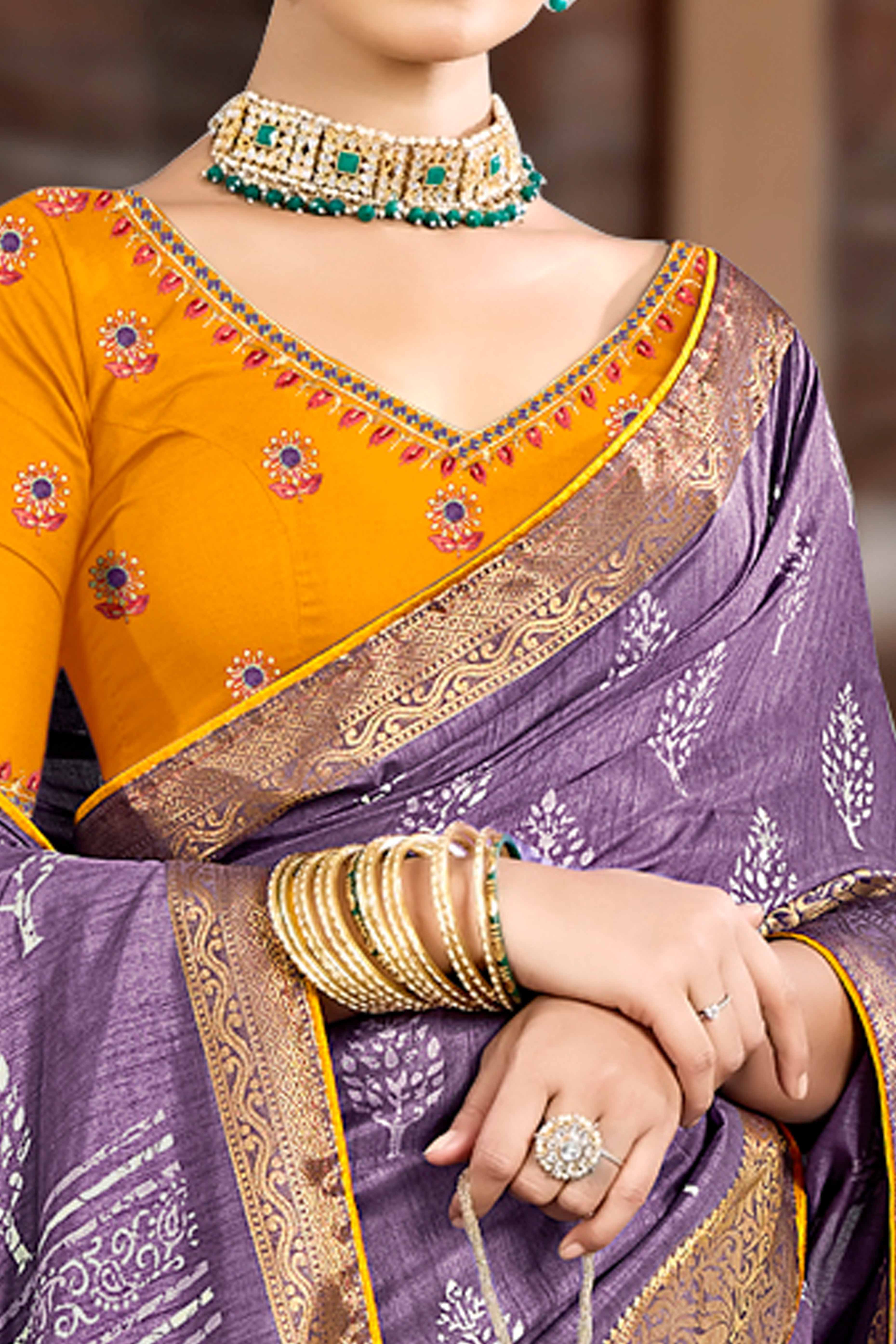 Purple Dola Silk Saree Featuring Artistic Print Work & Graceful Tassel Edging