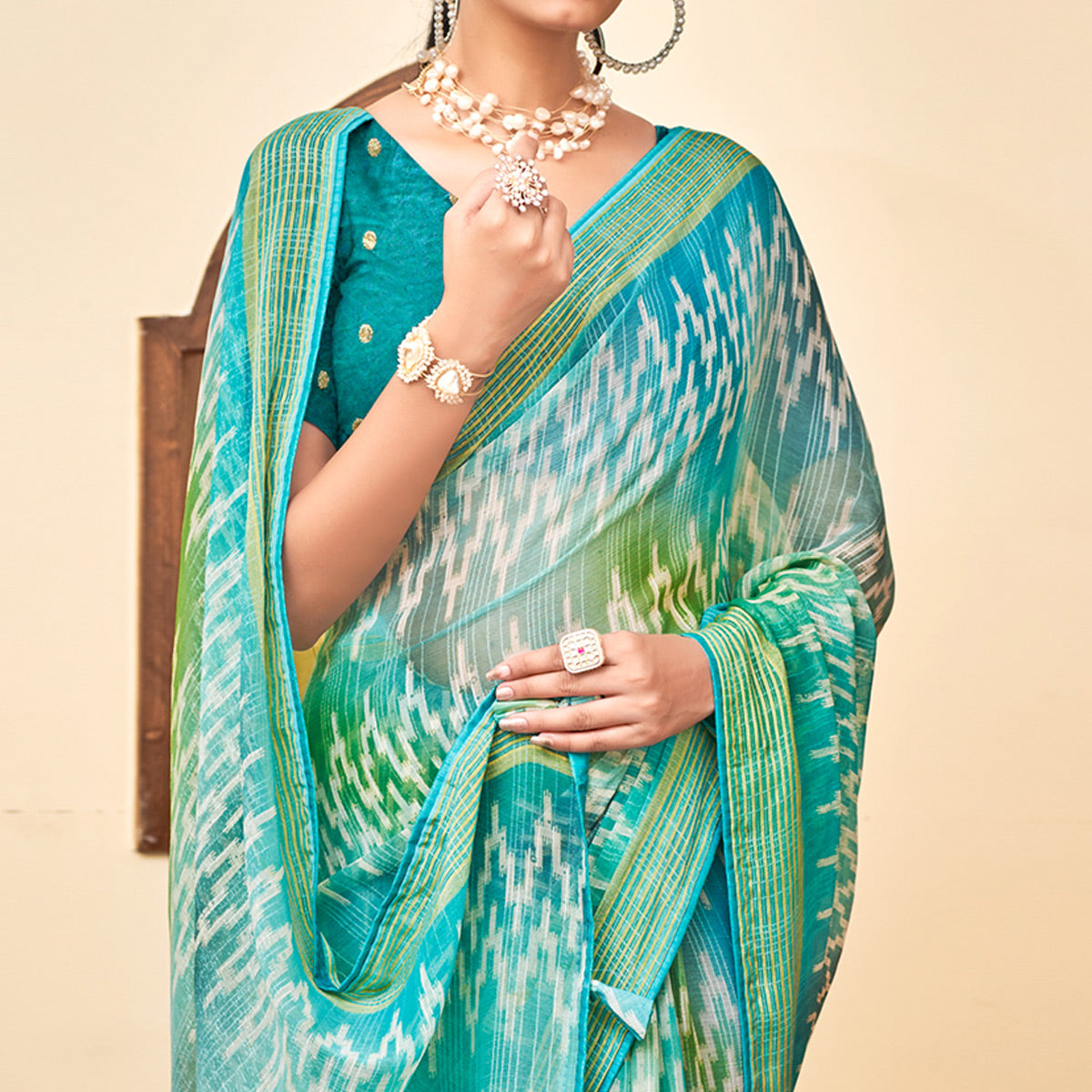 Blue & Green Ikkat Printed Chiffon Saree
