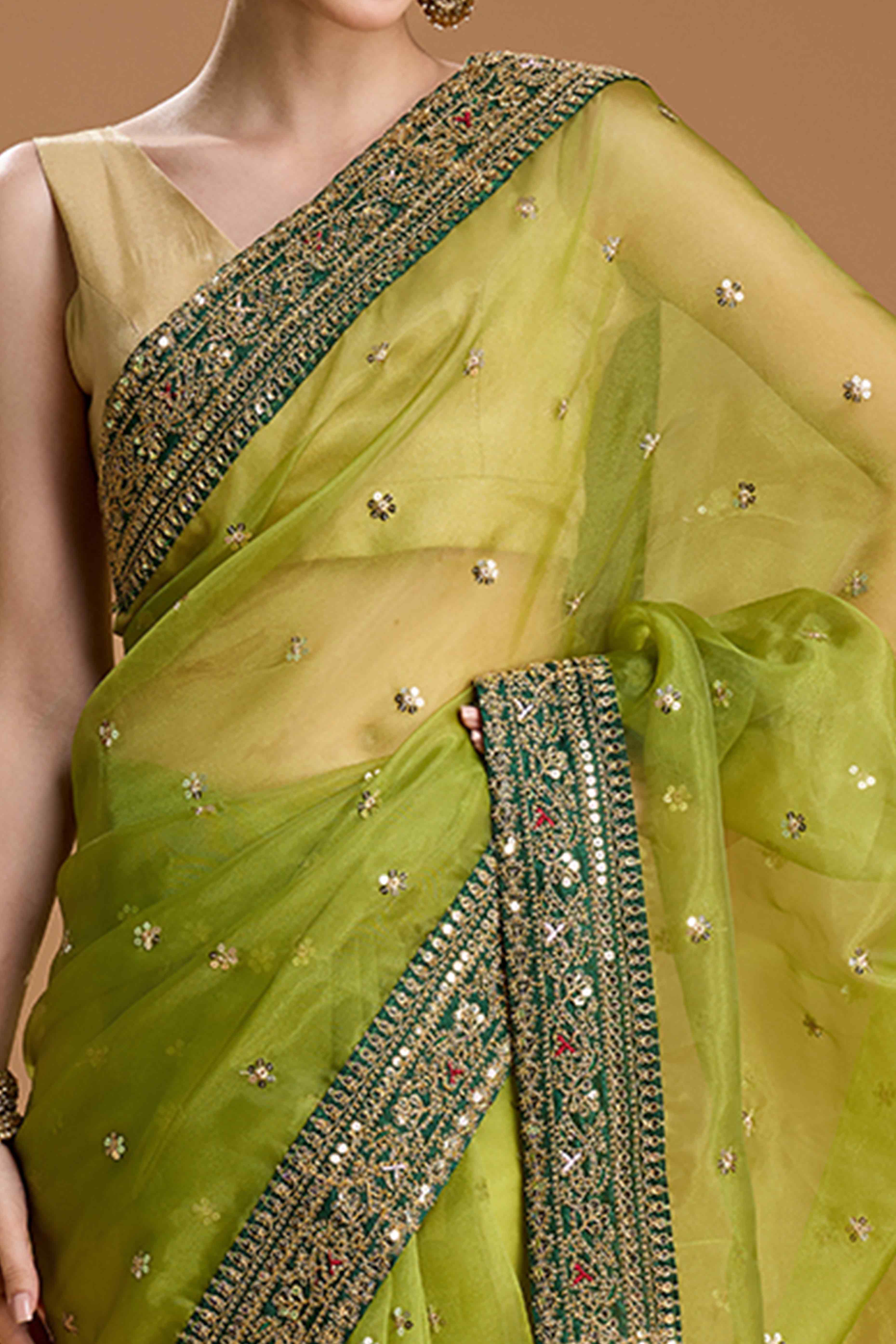 Green Organza Saree Enhanced with Elegant Sequins Embellishments
