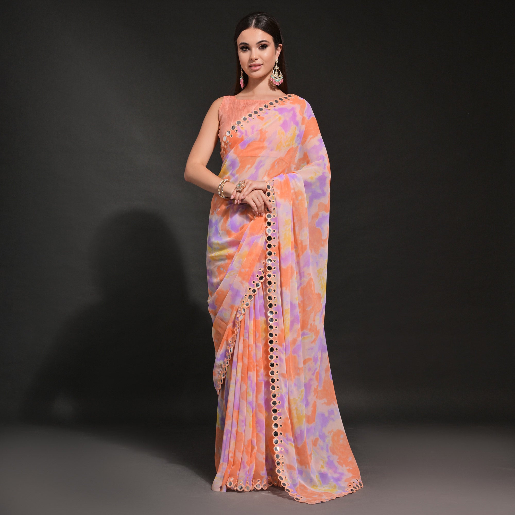 Peach Printed Georgette Saree With Embroidered Lace