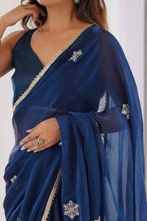 Blue Organza Saree Embellished with Intricate Floral Work and Elegant Lace Detailing
