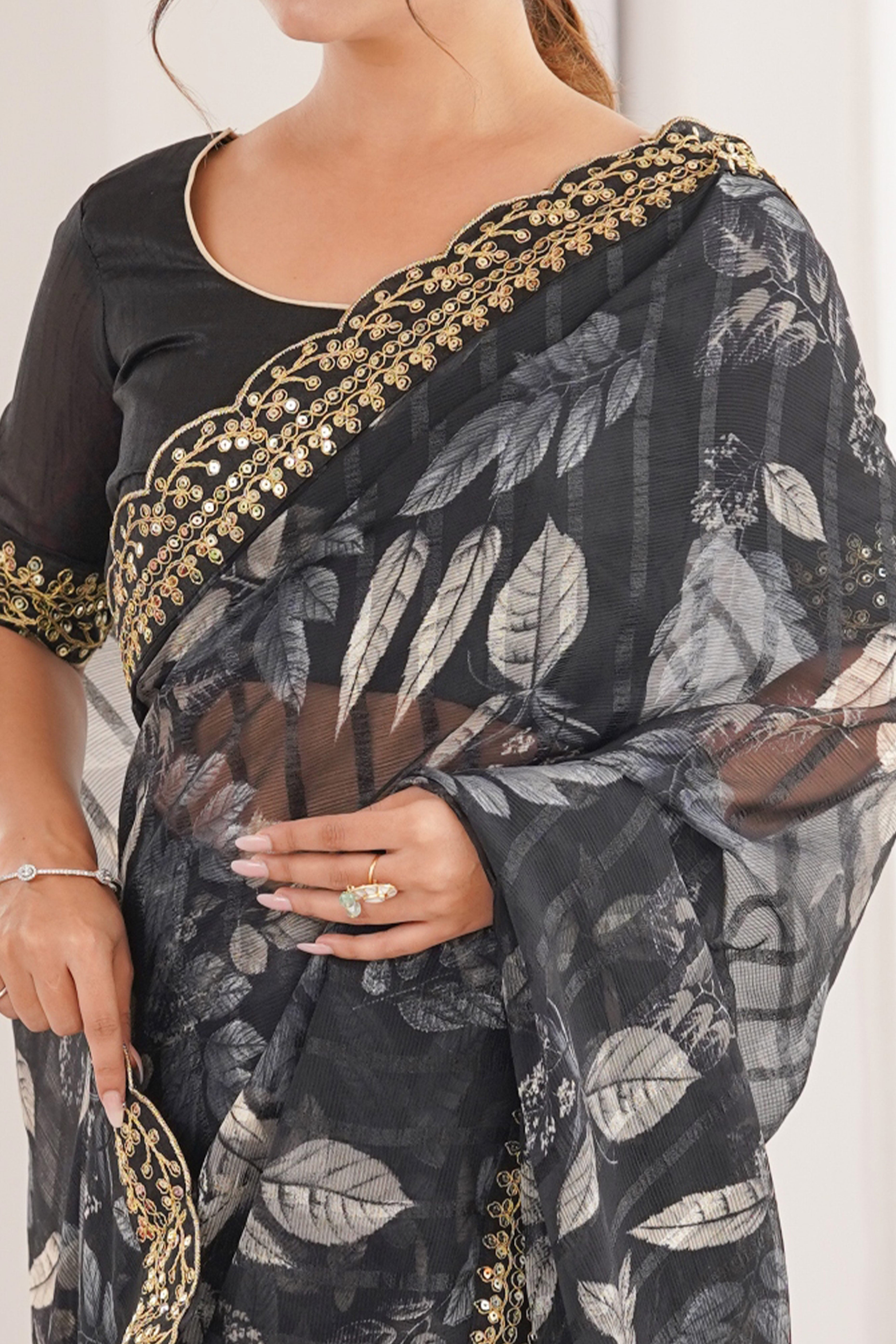Elegant Black Leaf & Floral Print Georgette Saree With Intricate Cording Sequins Embroidery Border