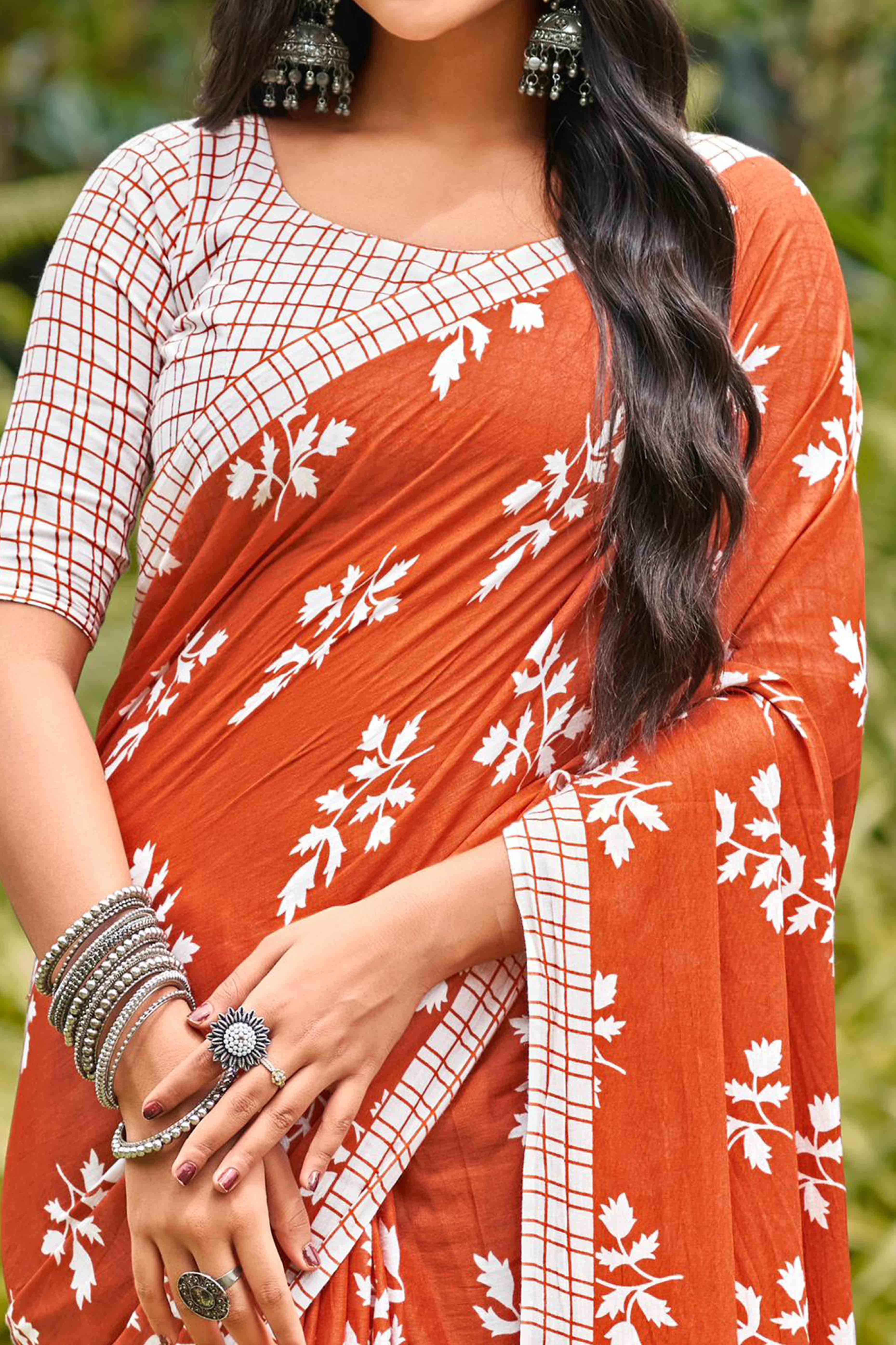 Rust Orange Pure Cotton Saree with Delicate Floral Patterns