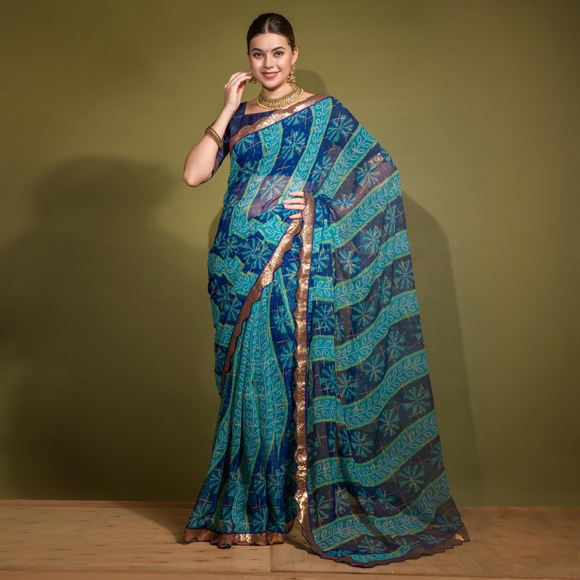 Blue Bandhani Foil Printed Georgette Saree With Embroidered Border