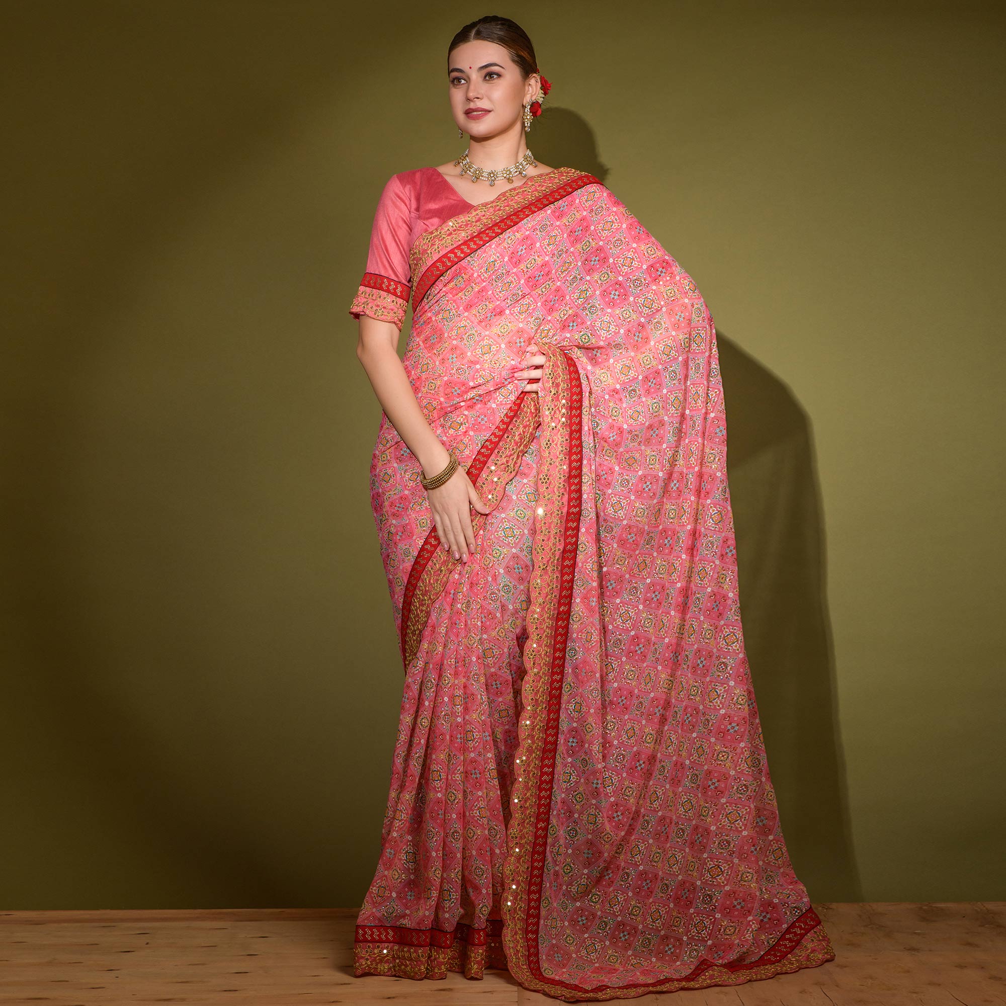 Pink Patola Foil Printed Georgette Saree with Embroidered Border