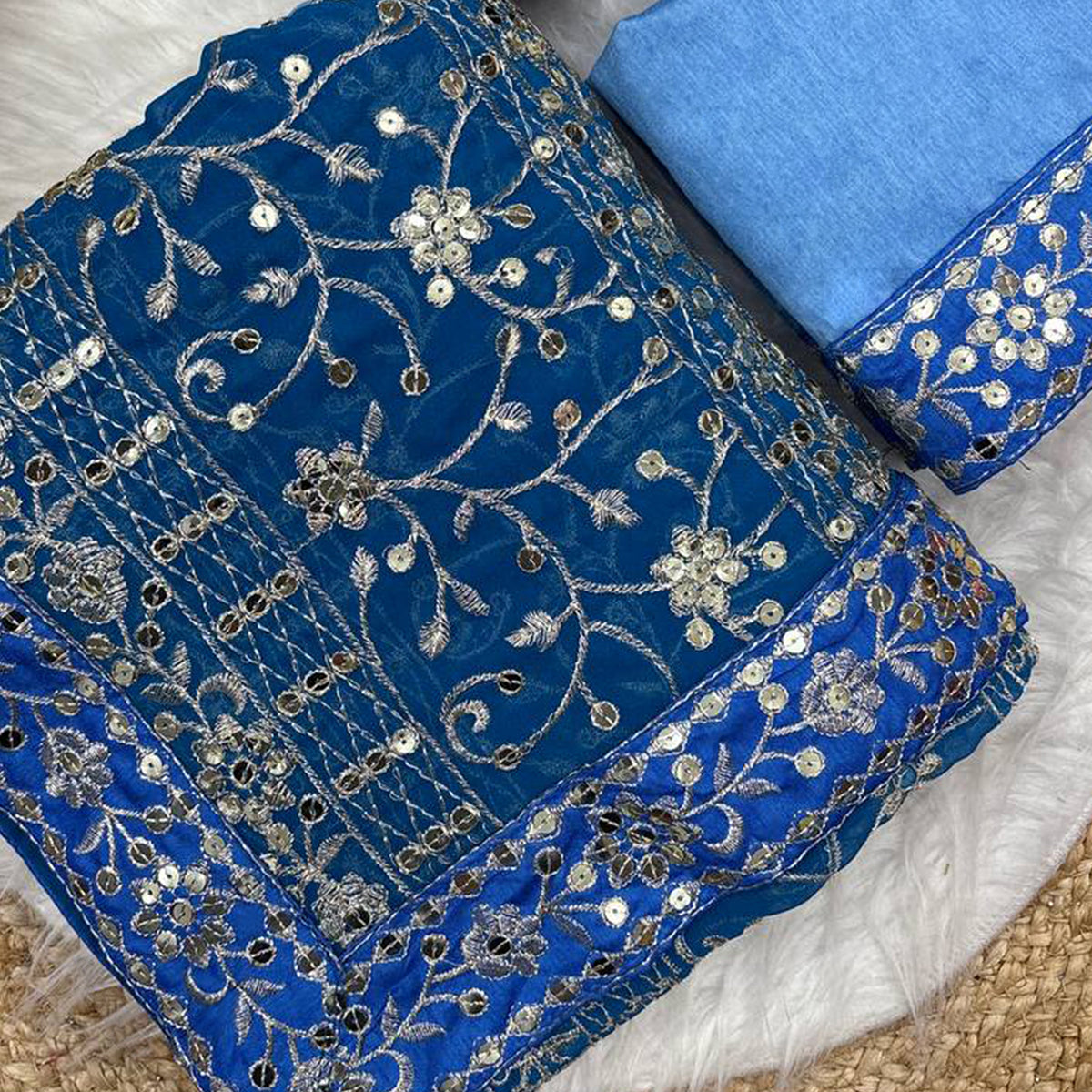 Beautiful Sky Blue Partywear Saree Crafted in Georgette with Sequins and Thread Work