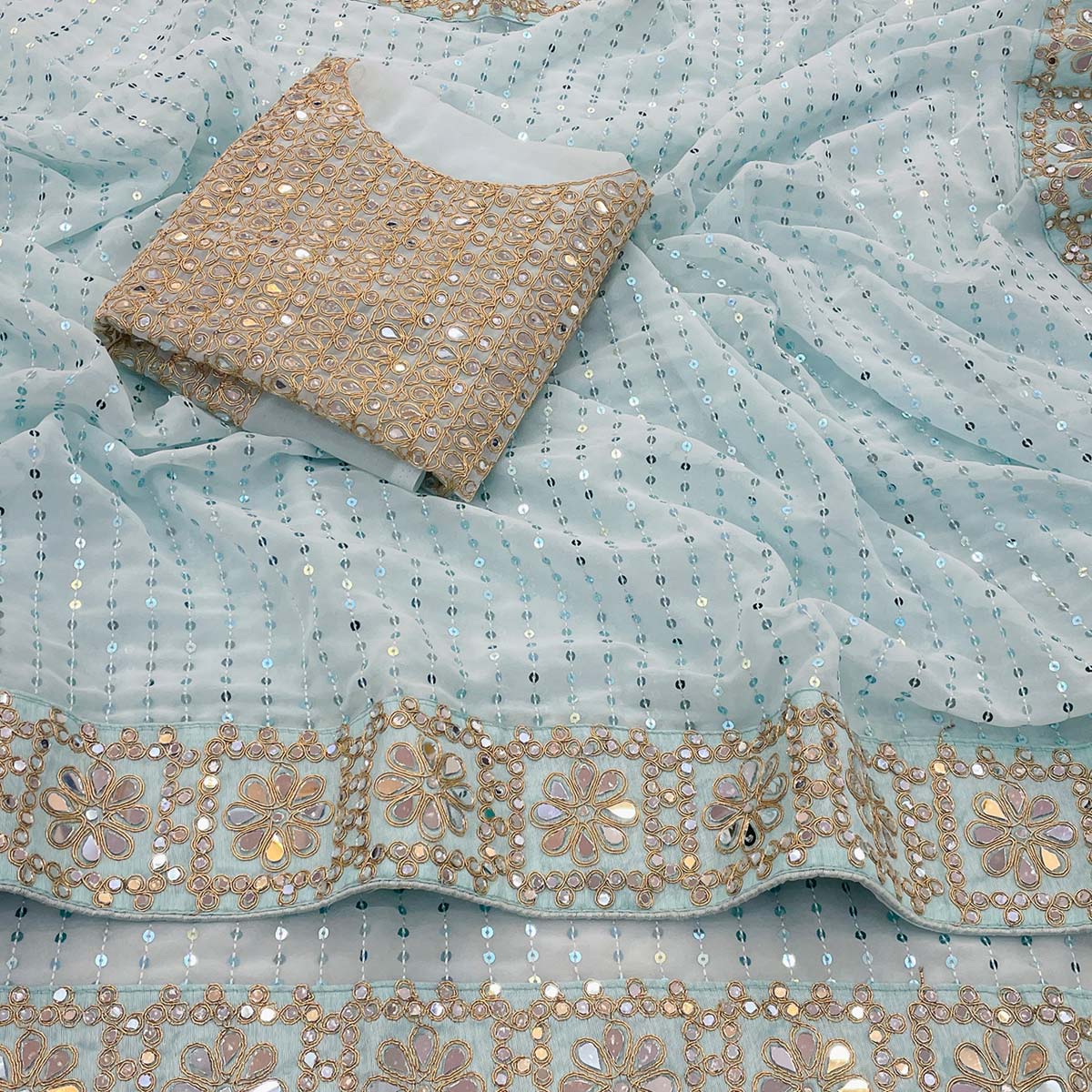 Sky Blue Faux Georgette Saree Adorned with Sequins Work and Elegant Embellishments