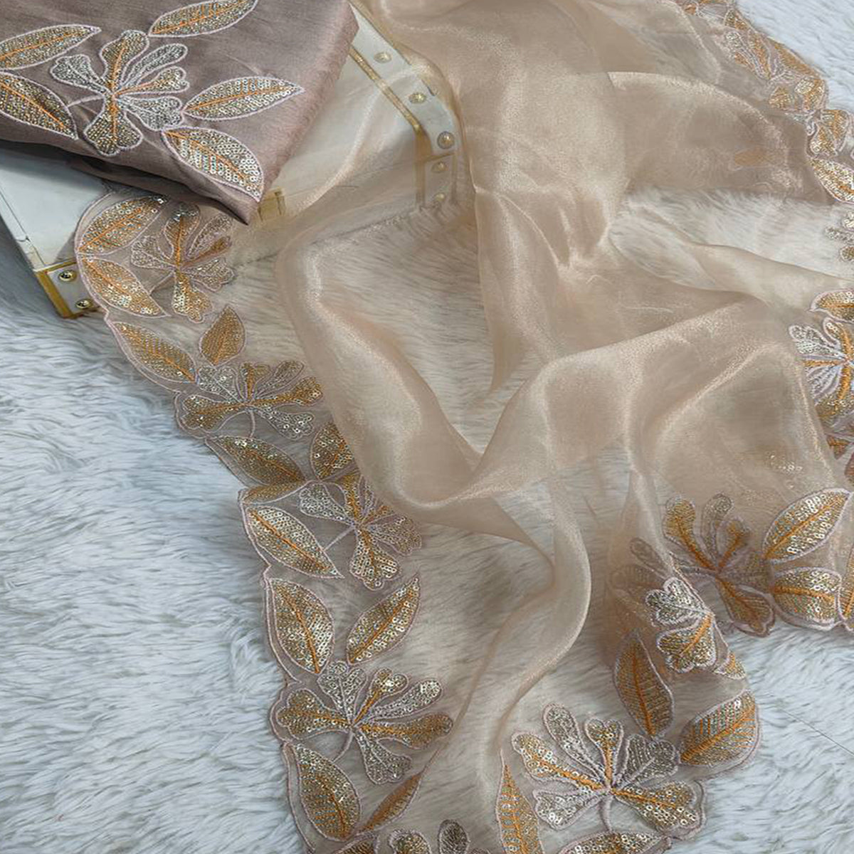 Sophisticated Beige Organza Silk Saree Beautified With Intricate Floral Embroidery & Sequins Work