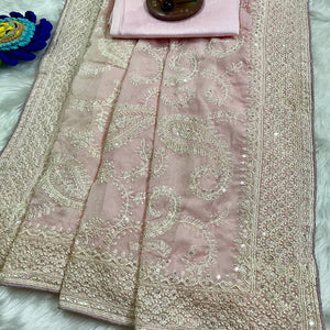 Lustrous Pink Organza Silk Saree Beautified With Paisley Embroidery & Glittering Sequins Work