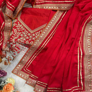 Red Festive Silk Blend Saree Highlighted with Silver Thread Work and Shimmering Sequins