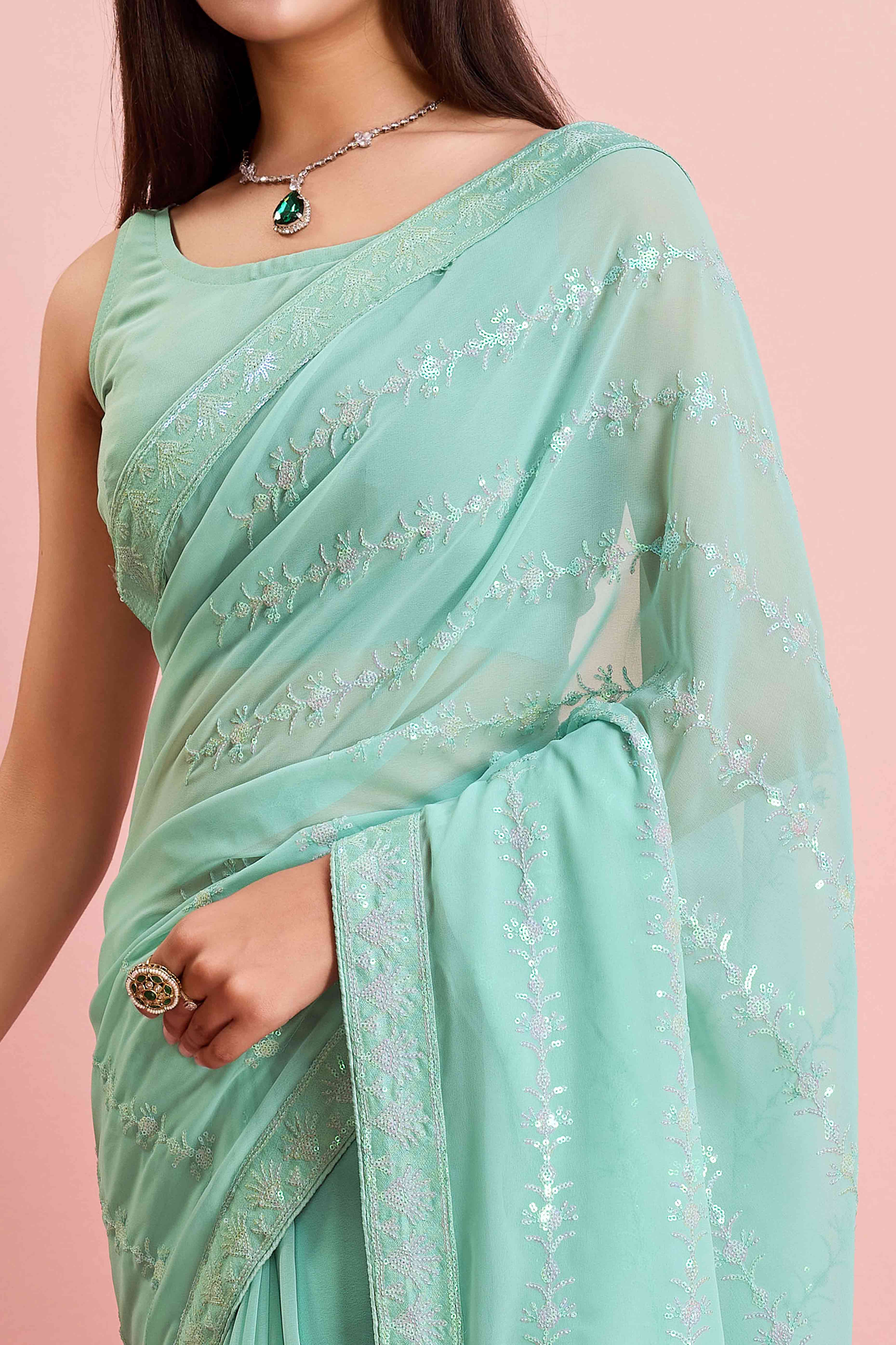 Turquoise Floral Sequins Embroidered Georgette Saree