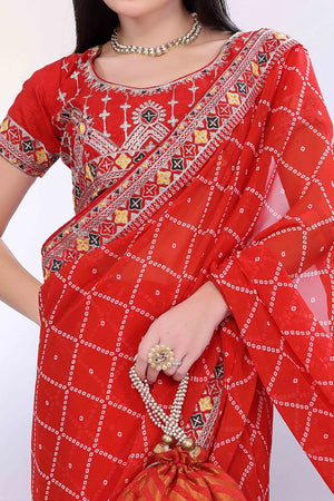 Red Bandhani Printed Georgette Saree Framed With Elegant Embroidered Border