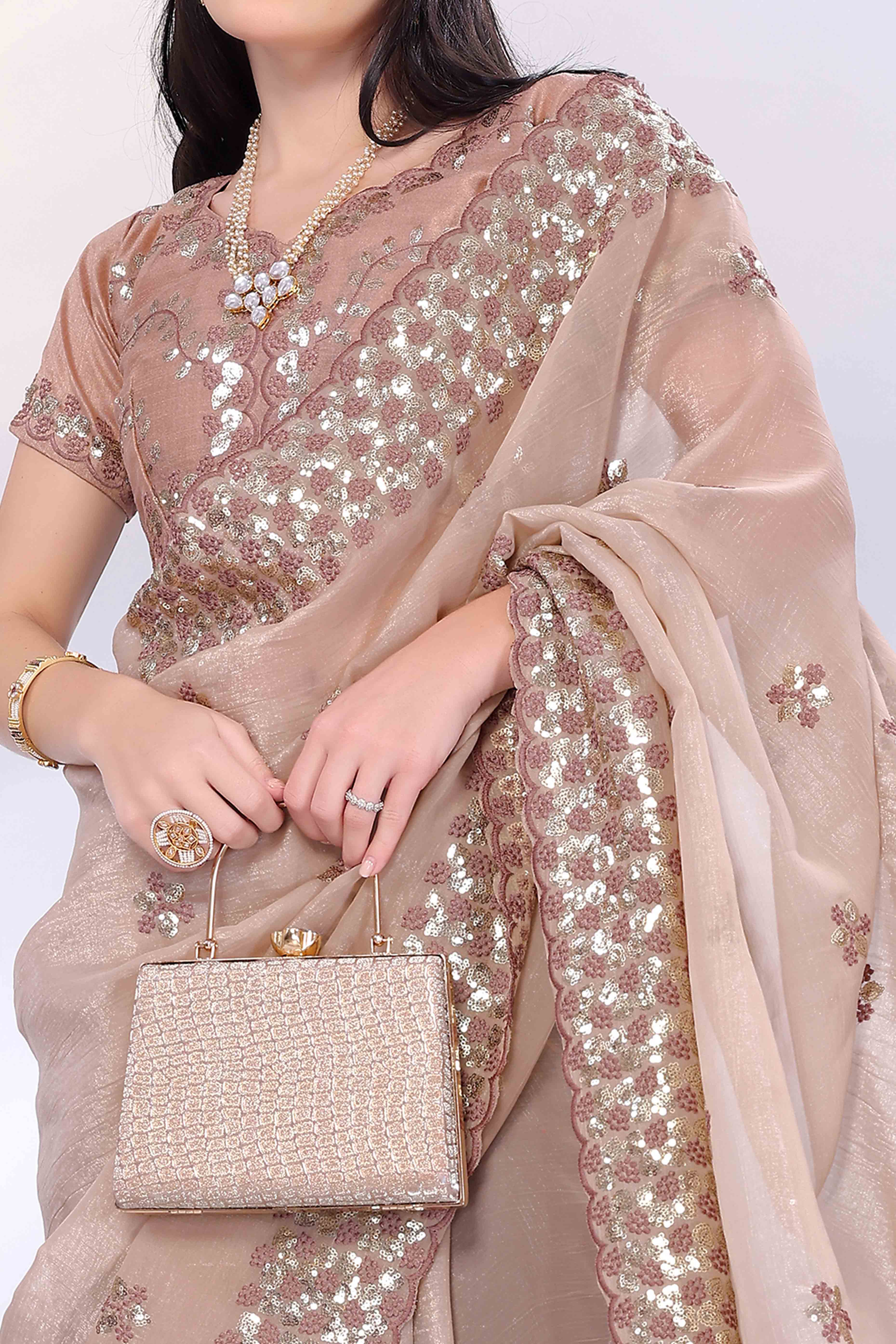 Beige Crunchy Organza Silk Saree Adorned With Intricate Floral Sequins Embroidery