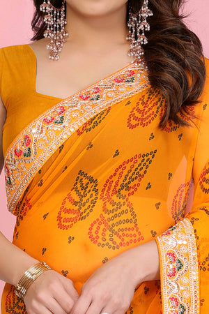 Mustard Georgette Saree with Traditional Bandhani Print and Lace Accents