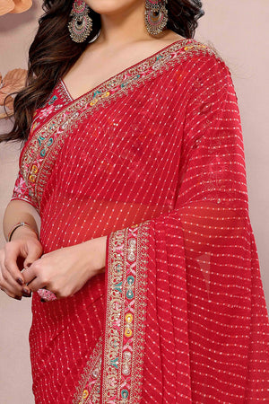 Red Striped Printed Georgette Saree With Glittering Sequin Cording Embroidered Border