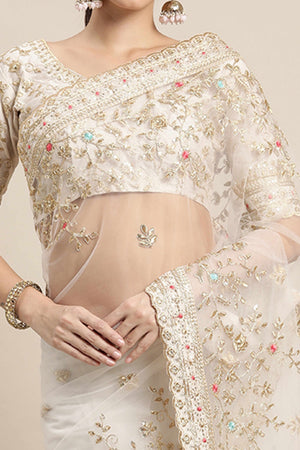 Cream Soft Net Saree With Delicate Floral Embroidery & Shimmering Sequins Work