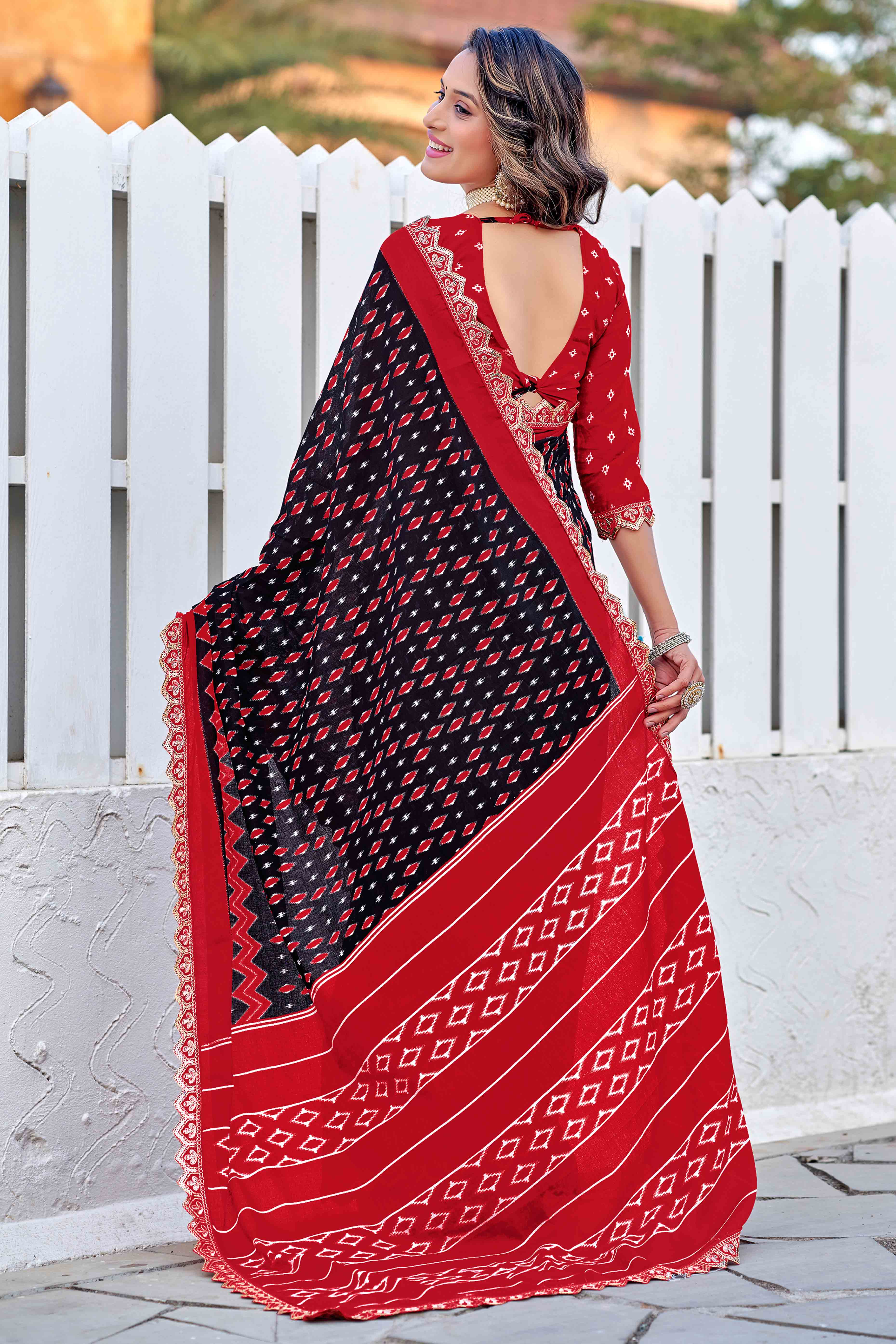 Mulmul Cotton Black & Red Ikkat Saree with Embroidered Lace Detailing