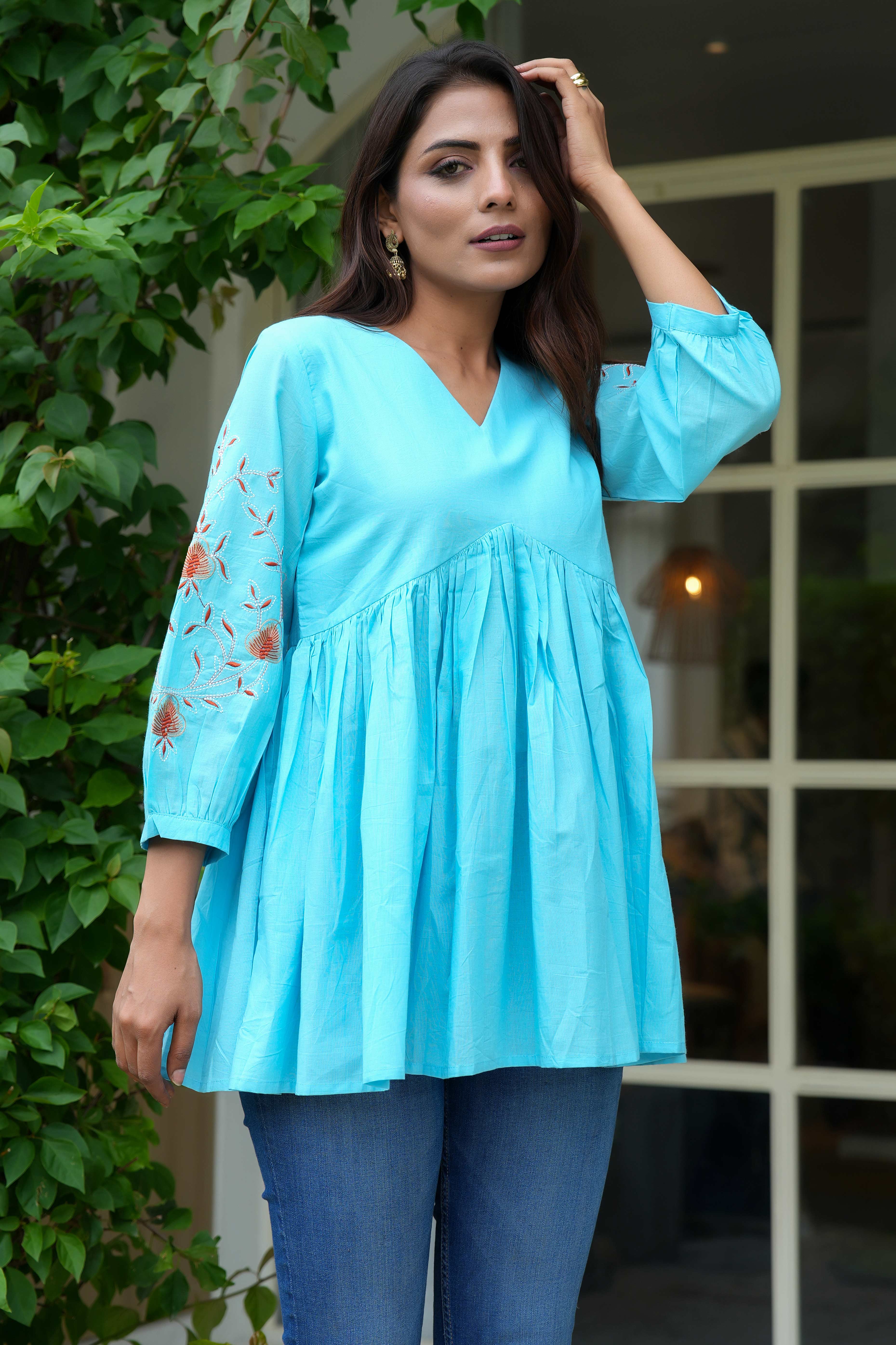Breezy Sky Blue Pure Cotton Alia Cut Short Top With Intricate Floral Embroidery