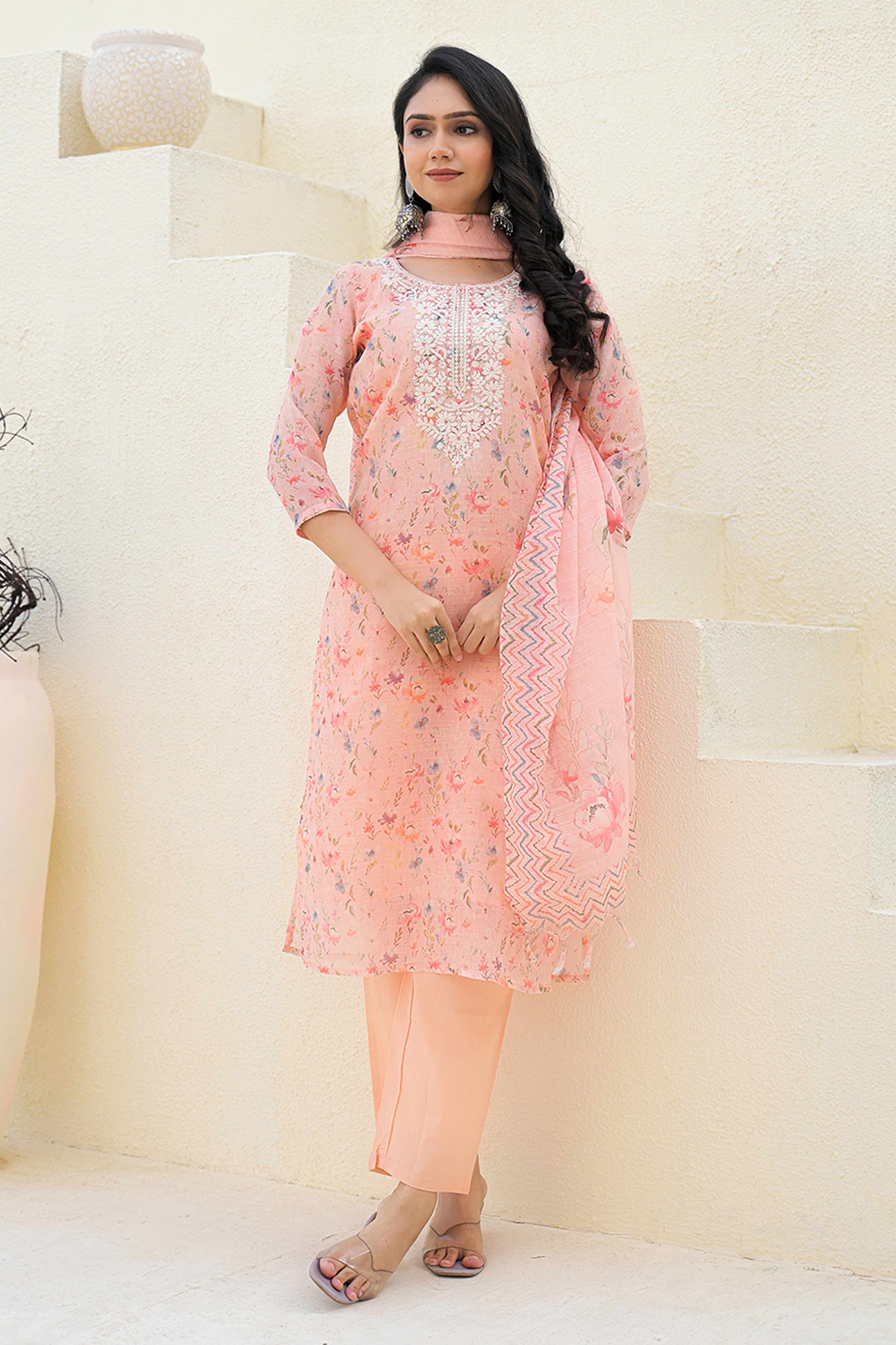 Graceful Peach Floral Printed Suit in Linen with Delicate Chikankari Embroidery