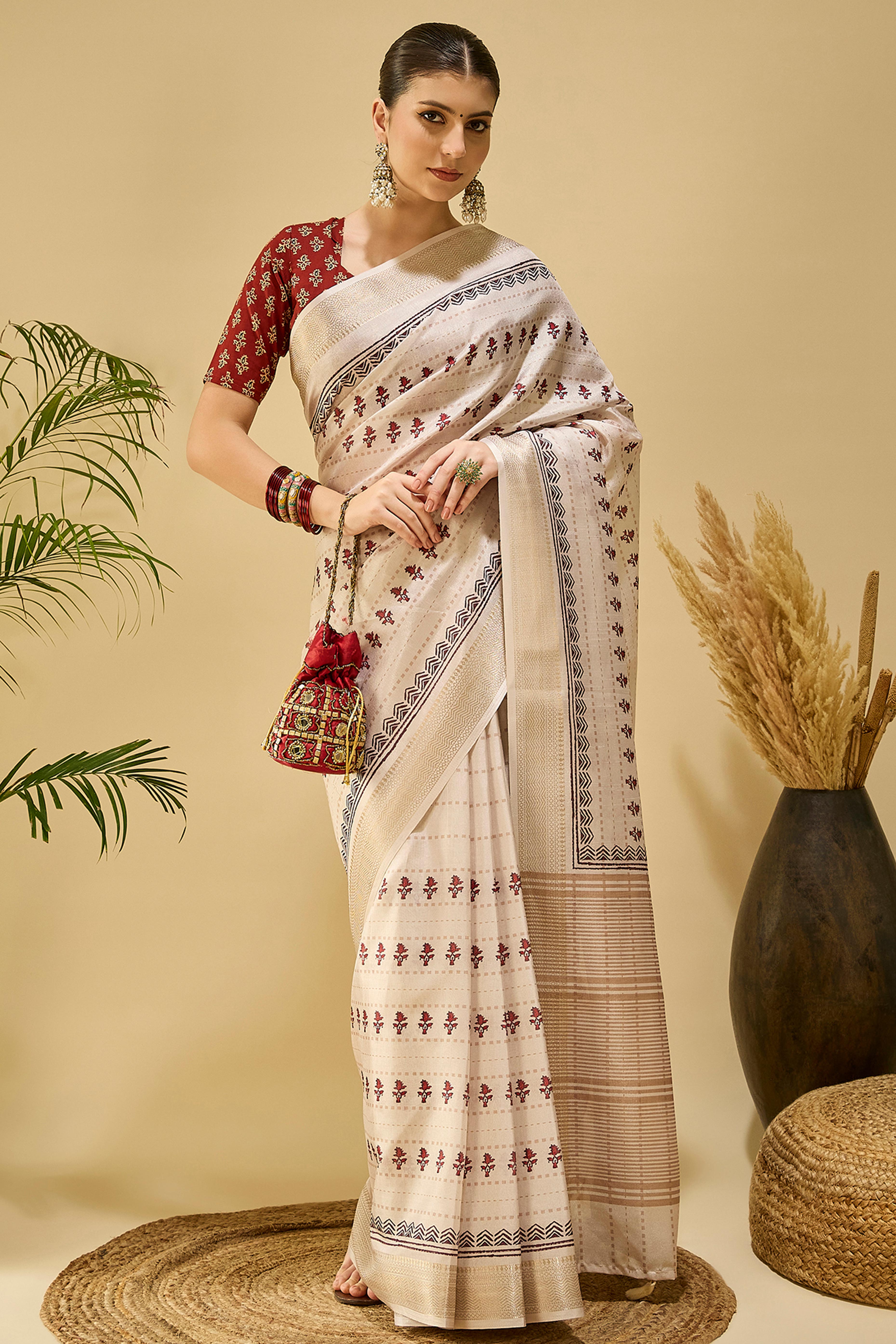 Soft Cream Katki Cotton-Silk Saree With Subtle Floral Motifs & Tassel Edge Pallu