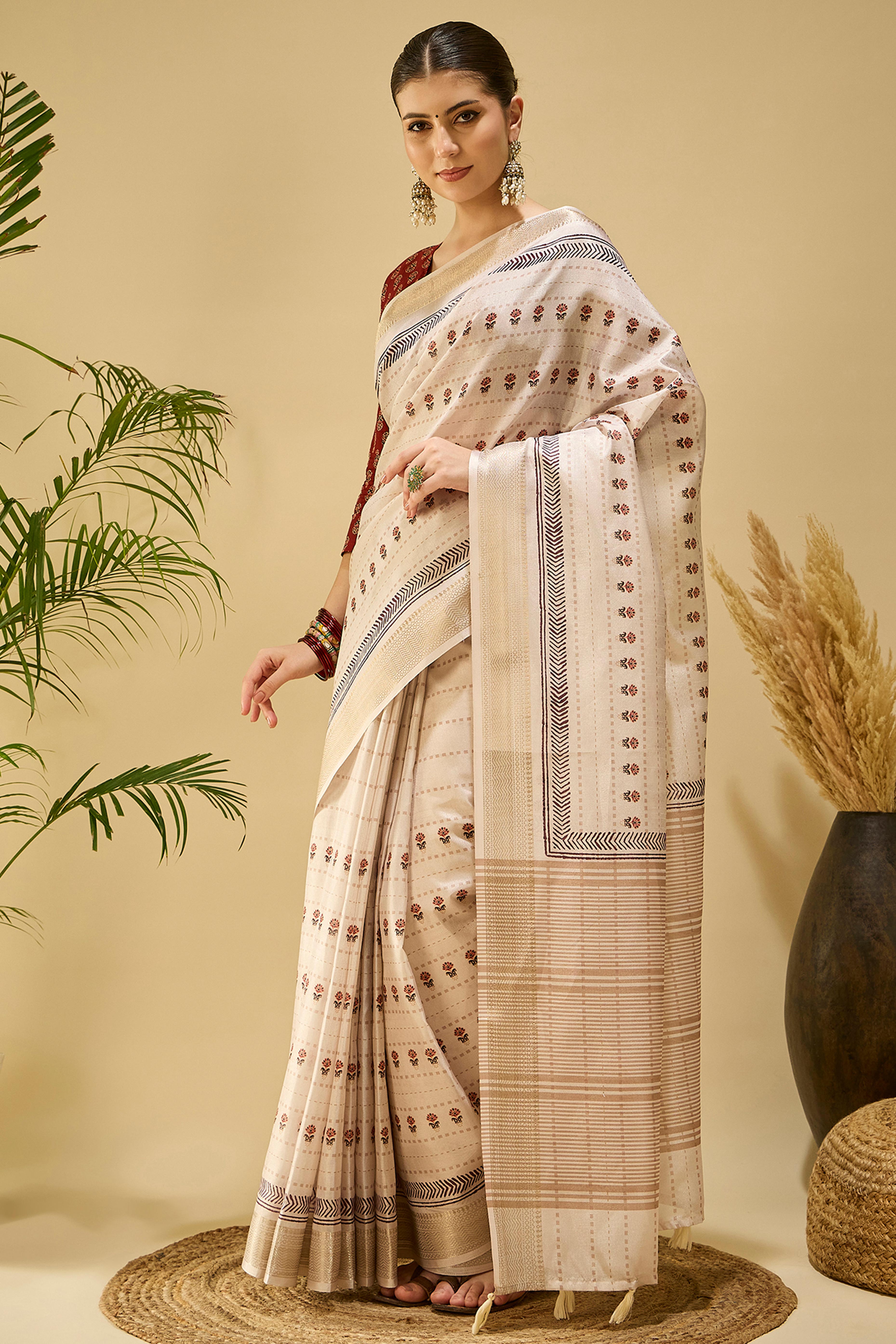Timeless Cream Katki Cotton Silk Saree With Blooming Floral Prints & Tassel Draped Pallu