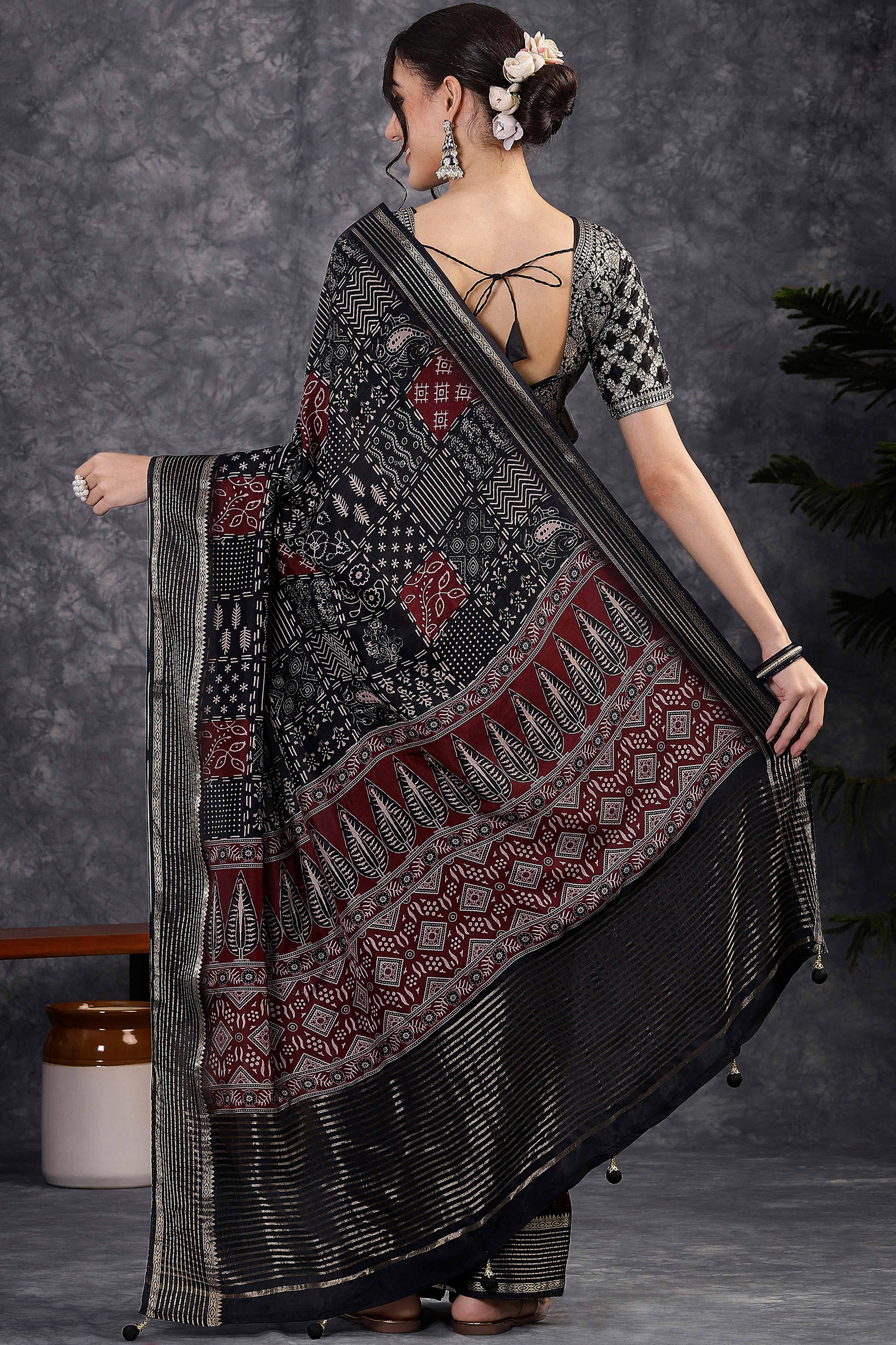 Black Dola Silk Saree Featuring Abstract Print & Jacquard Border