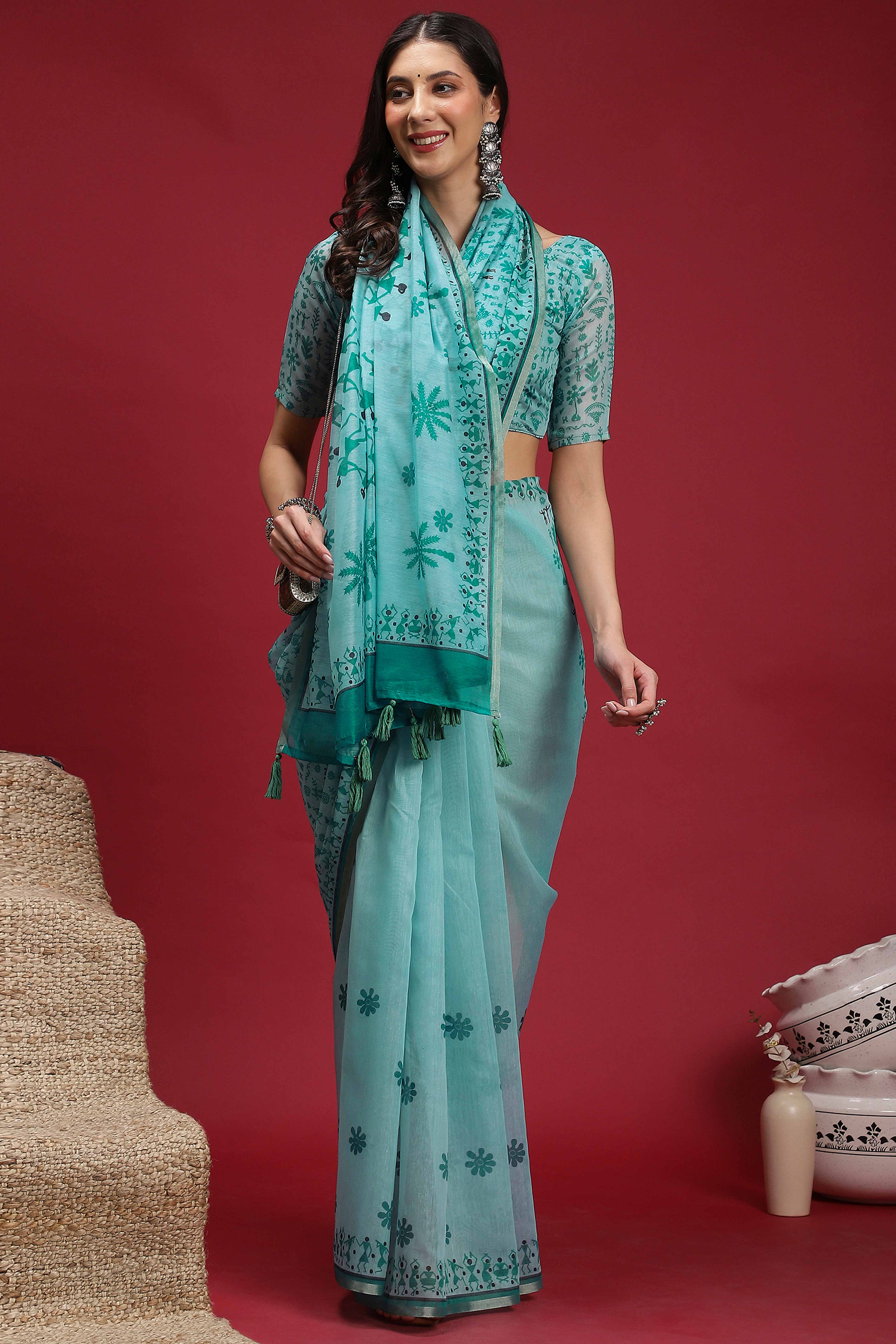 Turquoise Linen Cotton Saree Featuring Traditional Warli Prints & Tassel Pallu