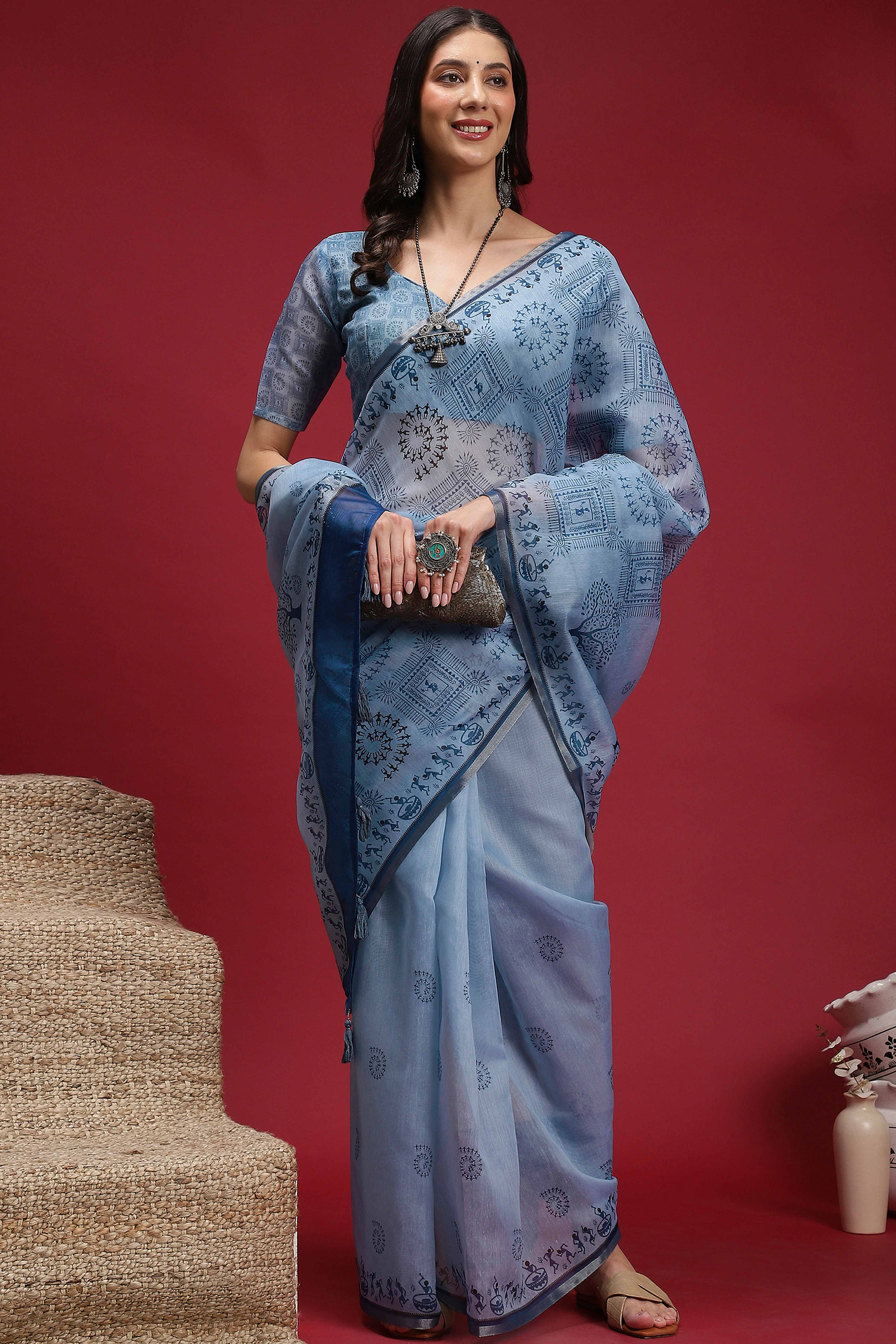 Powder Blue Linen Cotton Saree Featuring Traditional Warli Prints & Tassel Pallu