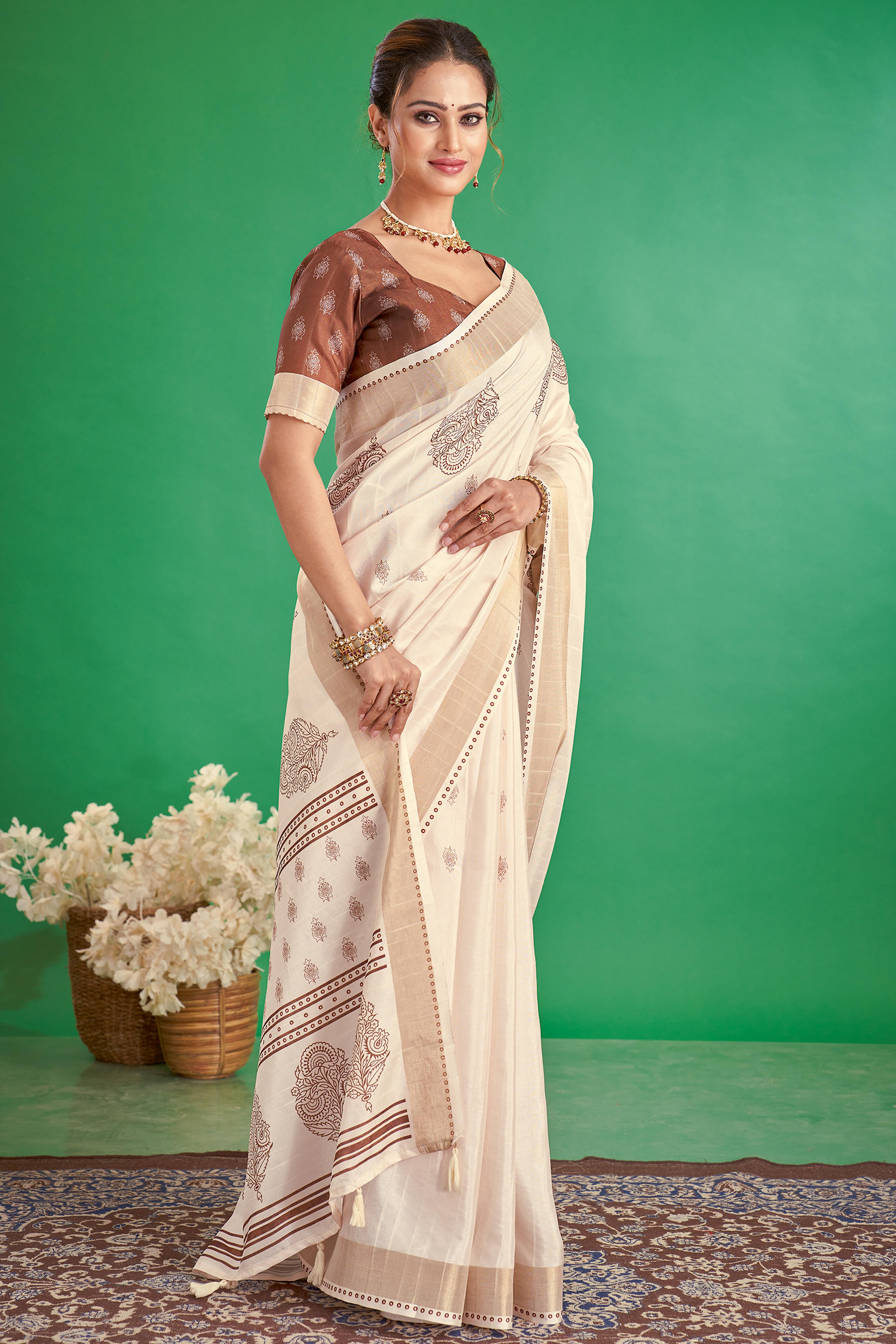 Charming Offwhite & Brown Floral Printed Kotha Cotton Silk Saree Adorned With Graceful Tassel Pallu