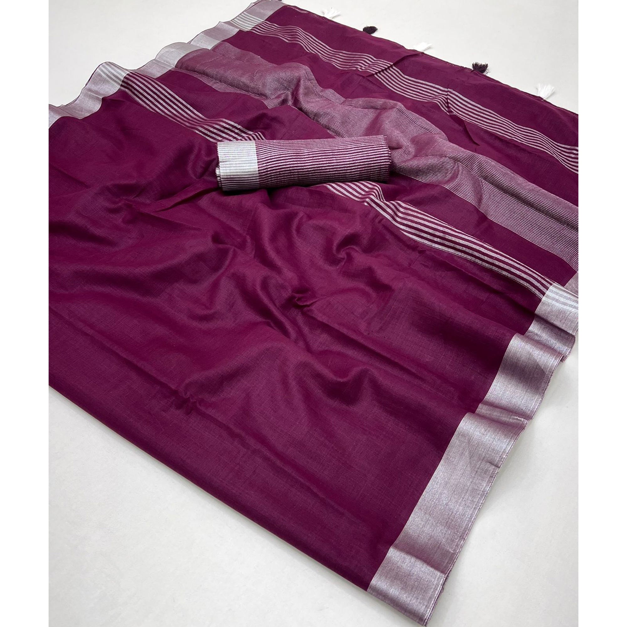 Wine Solid Pure Linen Saree With Zari Woven Border